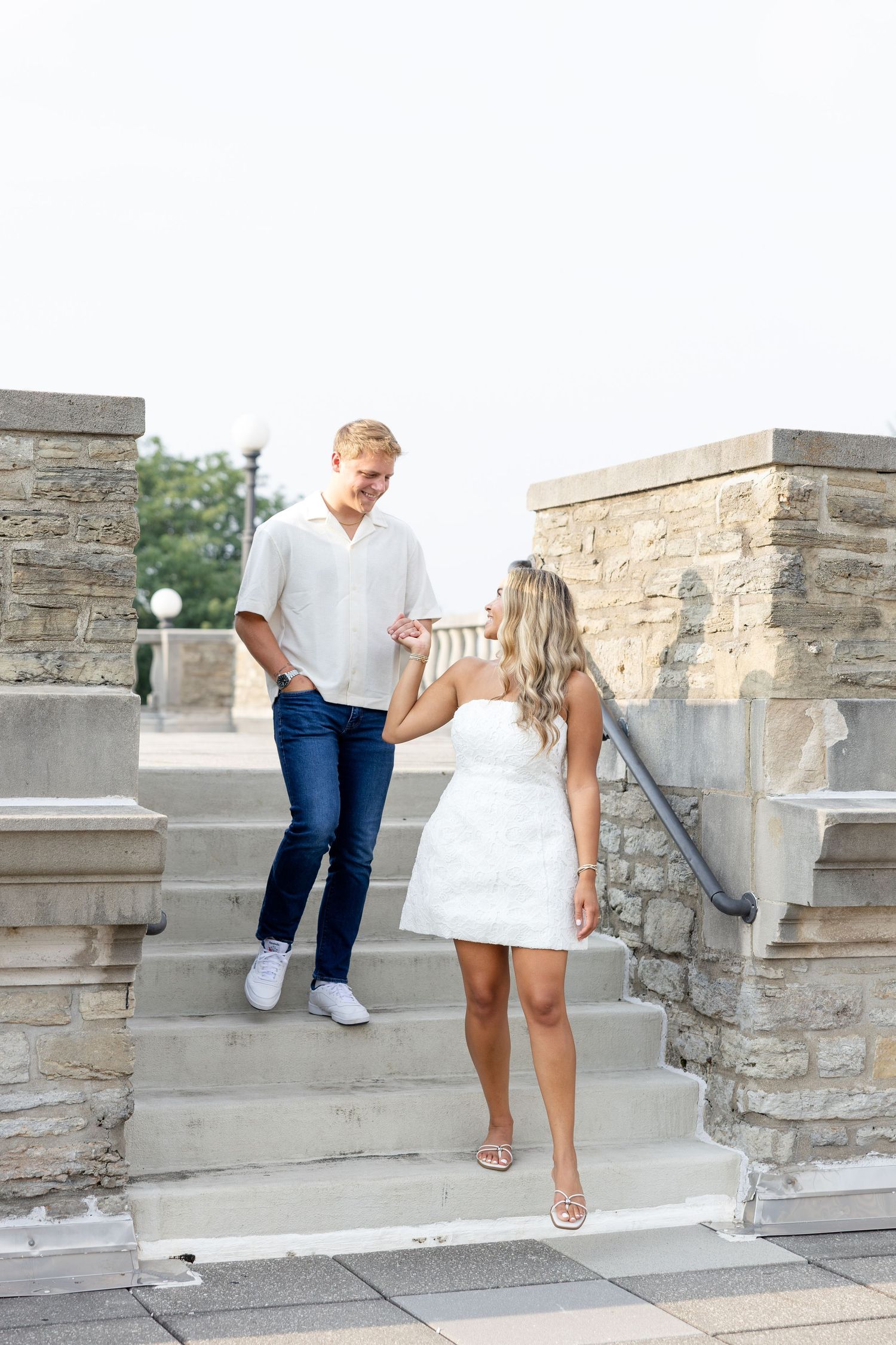 Romantic Ault Park engagement photos in Cincinnati, Ohio by Julia & Sean Photography, capturing a joyful couple during a golden hour engagem