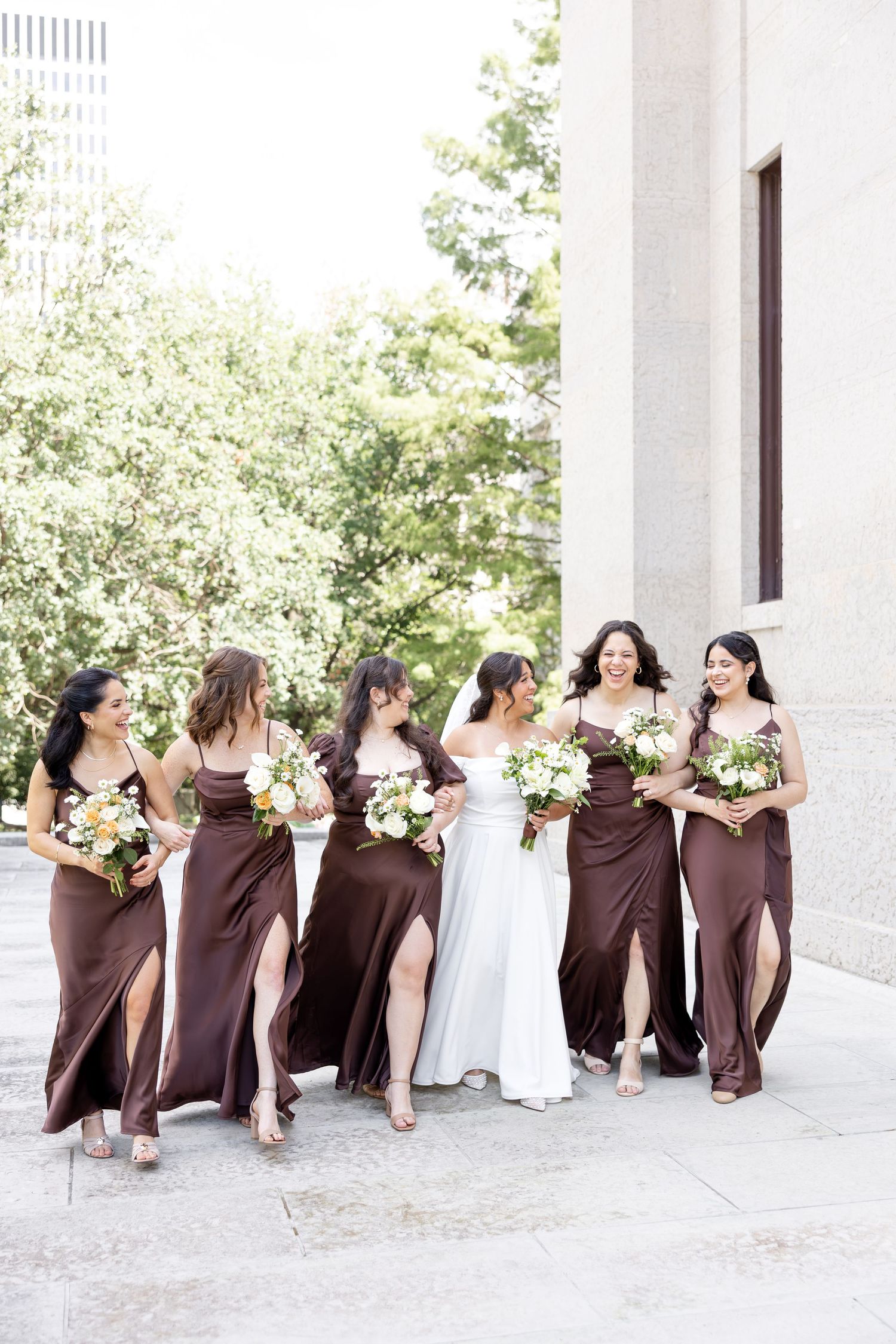 Bride and groom celebrating their Flat 51 wedding in downtown Columbus, Ohio, captured with timeless, light and airy wedding photography.