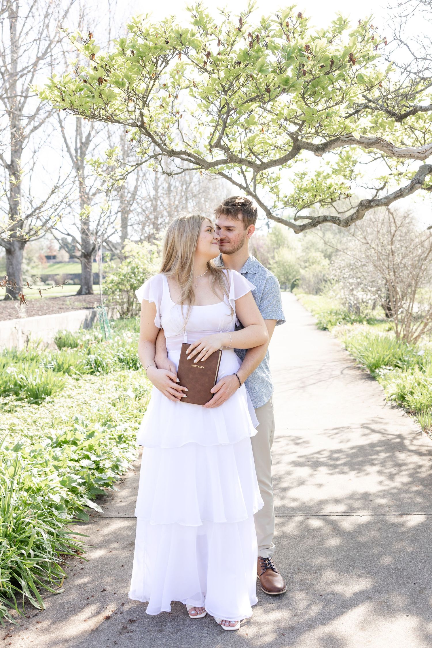 Cincinnati engagement session at Ault Park with light and airy style, capturing joyful, natural moments in a spring park setting