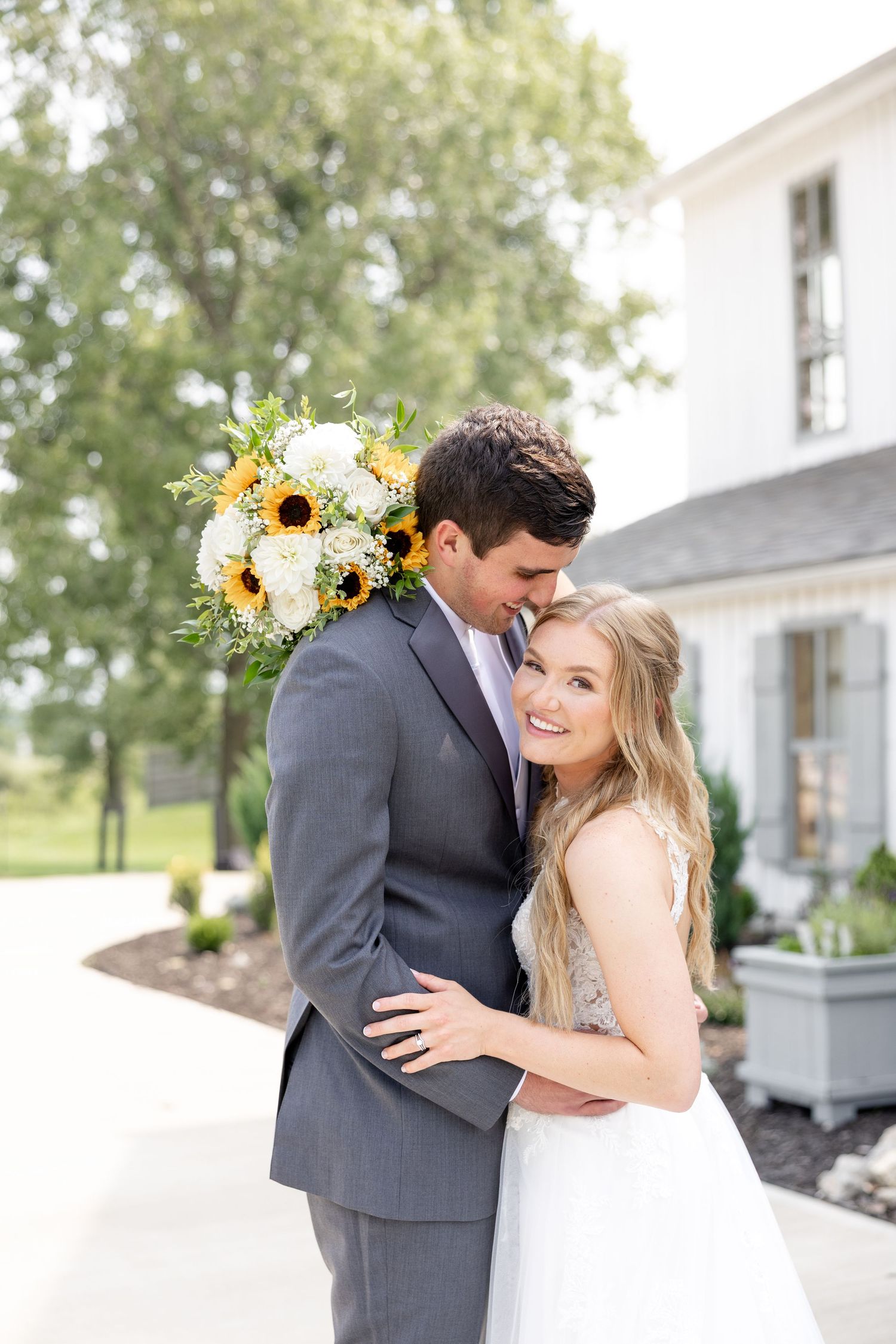 Joyful summer wedding at The Bicentennial Barn in Dayton, Ohio, photographed by Dayton wedding photographers Julia and Sean Photography.