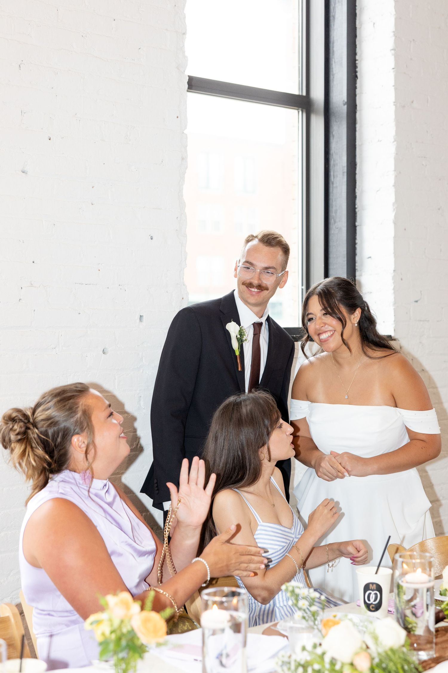 Wedding reception at Flat 51 in downtown Columbus, Ohio, featuring elegant reception details, heartfelt moments, and joyful celebration.