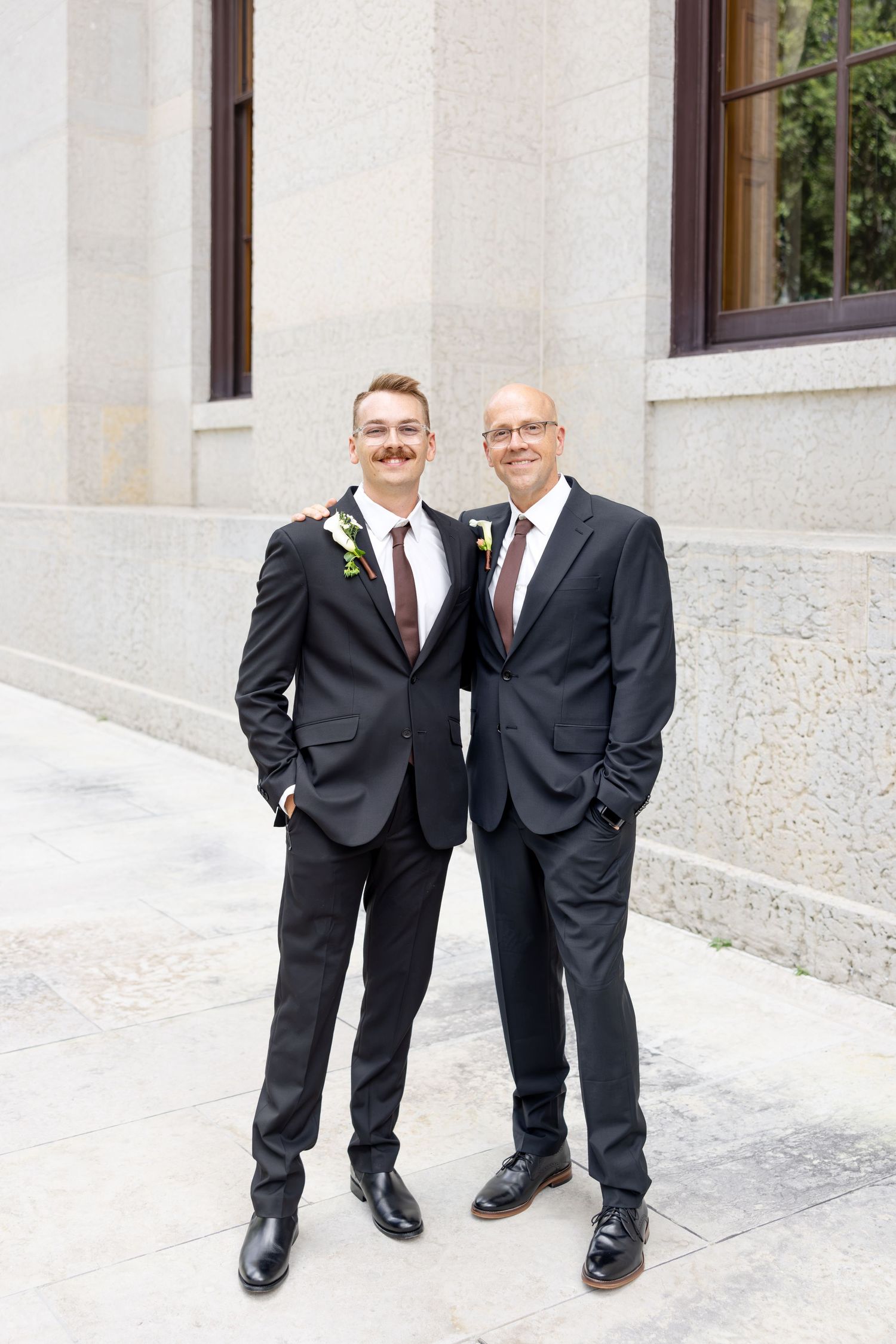 Bride and groom celebrating their Flat 51 wedding in downtown Columbus, Ohio, captured with timeless, light and airy wedding photography.