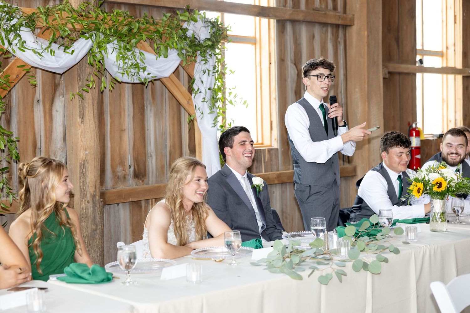Joyful summer wedding at The Bicentennial Barn in Dayton, Ohio, photographed by Dayton wedding photographers Julia and Sean Photography.