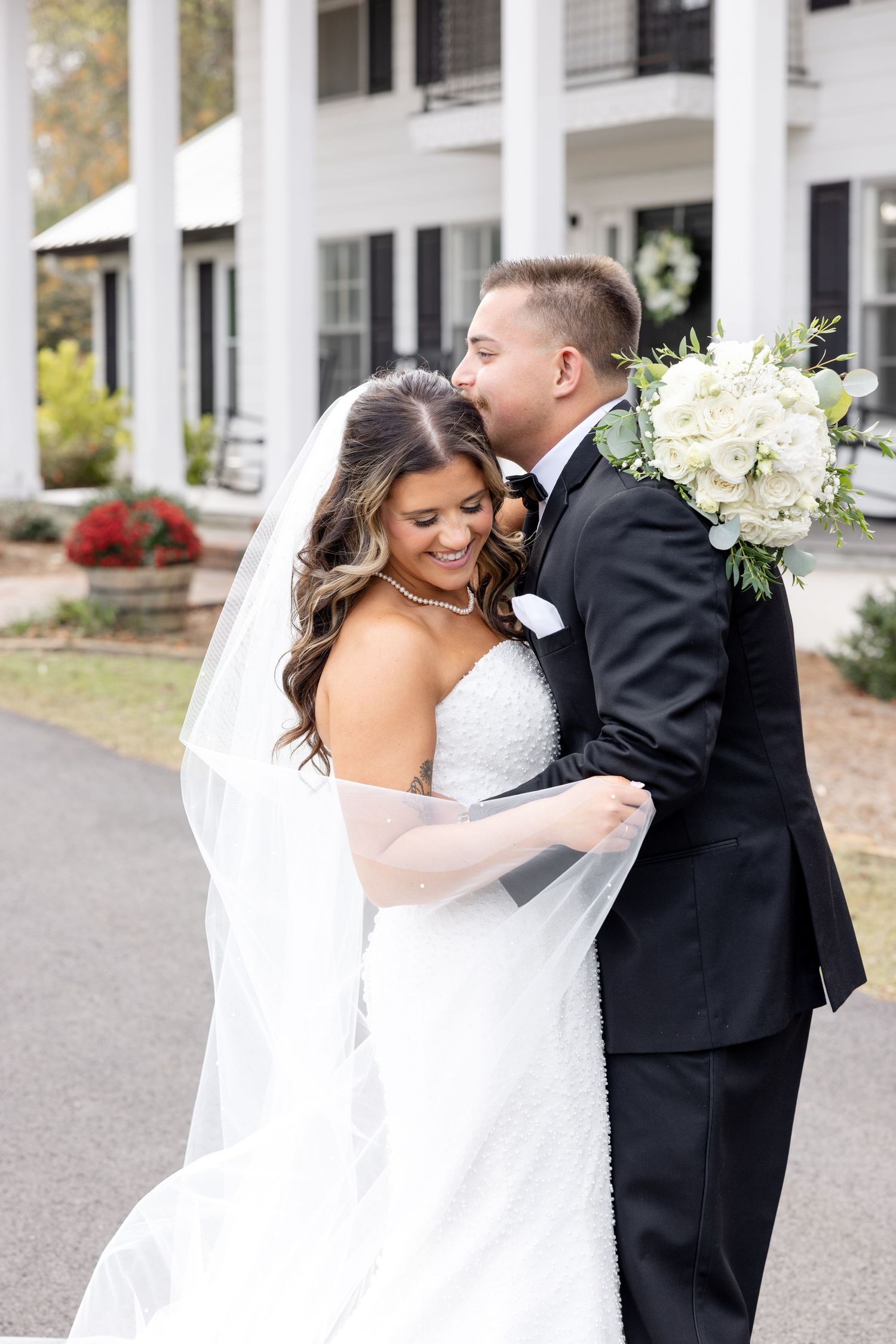 Elegant wedding at The Upton House in Guntersville, Alabama featuring a joyful bride and groom and timeless southern elegance.