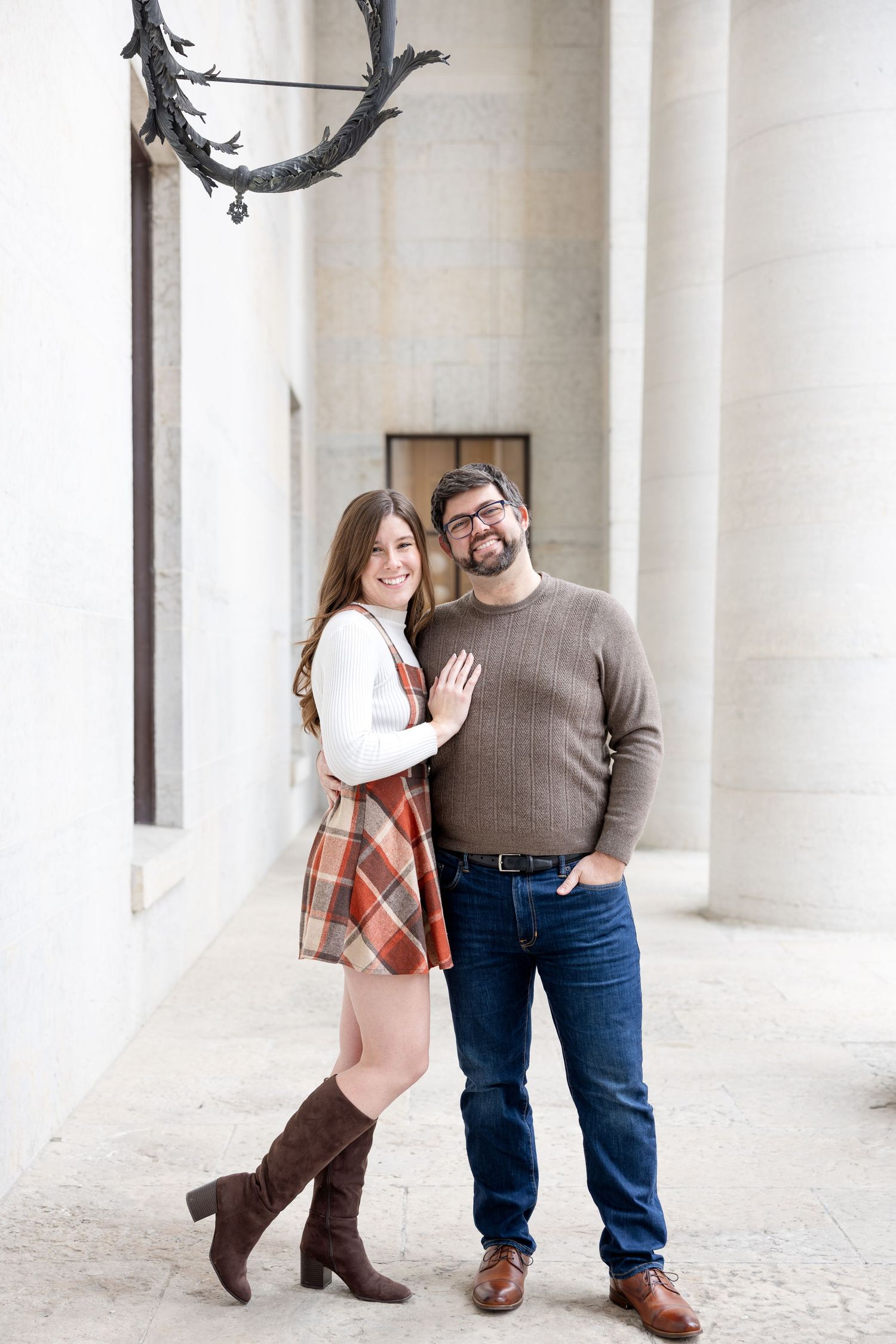 Ohio Statehouse engagement photos in downtown Columbus Ohio with a joyful couple in a light and airy style