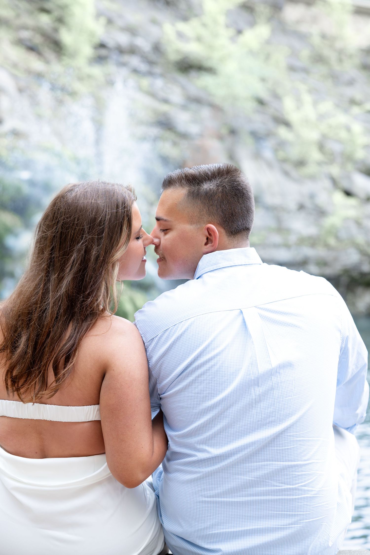 Downtown Huntsville engagement session at First National Bank and Big Spring Park by Julia and Sean Photography, capturing joyful moments.