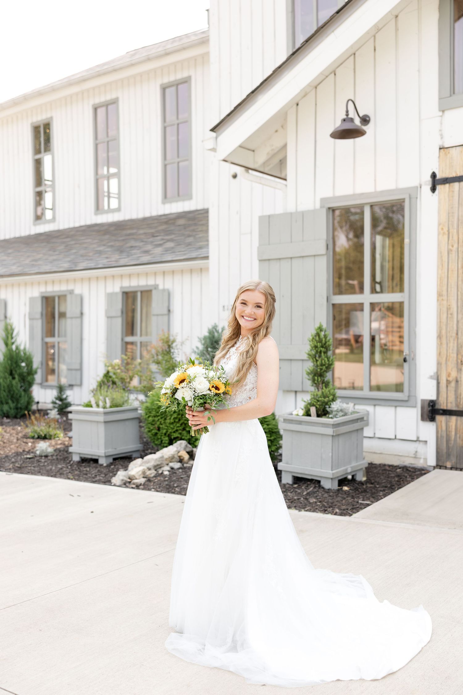 Joyful summer wedding at The Bicentennial Barn in Dayton, Ohio, photographed by Dayton wedding photographers Julia and Sean Photography.