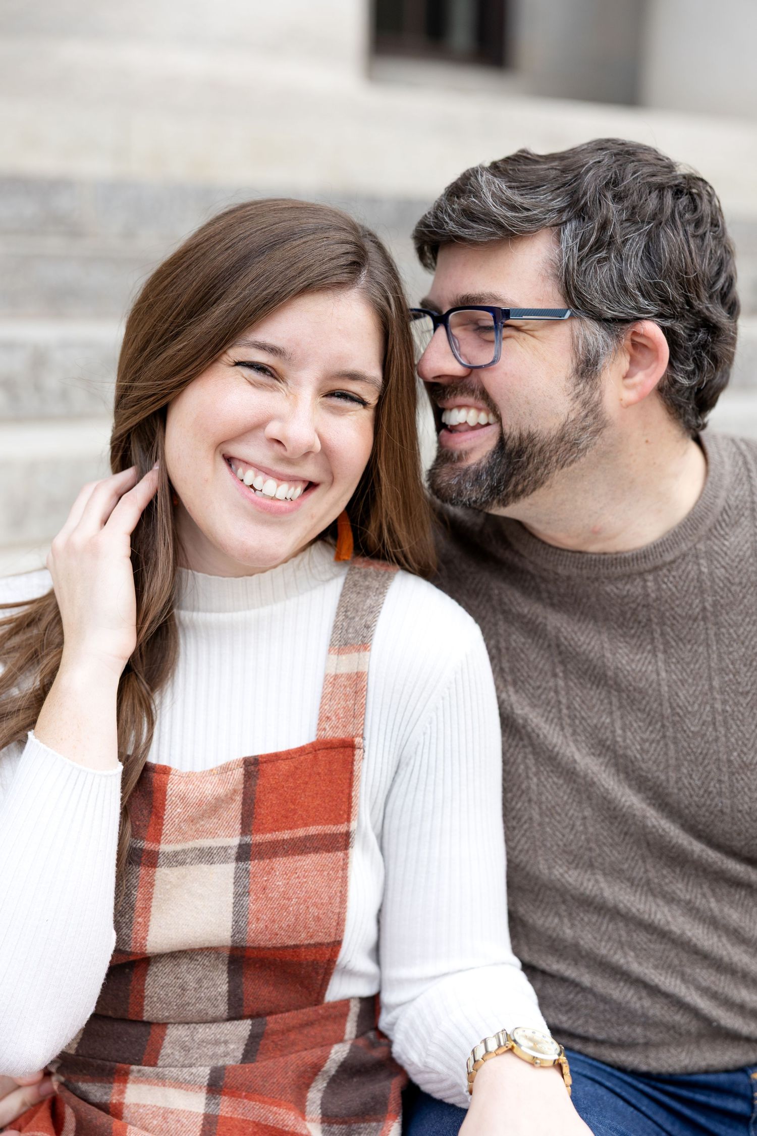 Ohio Statehouse engagement photos in downtown Columbus Ohio with a joyful couple in a light and airy style