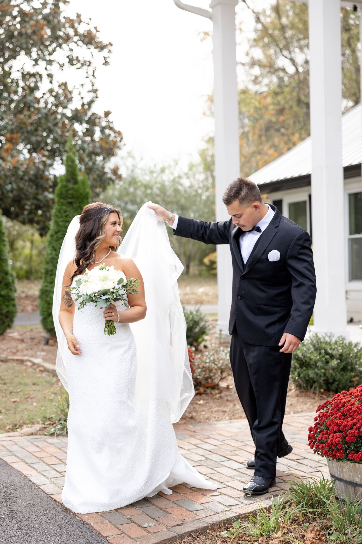 Elegant wedding at The Upton House in Guntersville, Alabama featuring a joyful bride and groom and timeless southern elegance.
