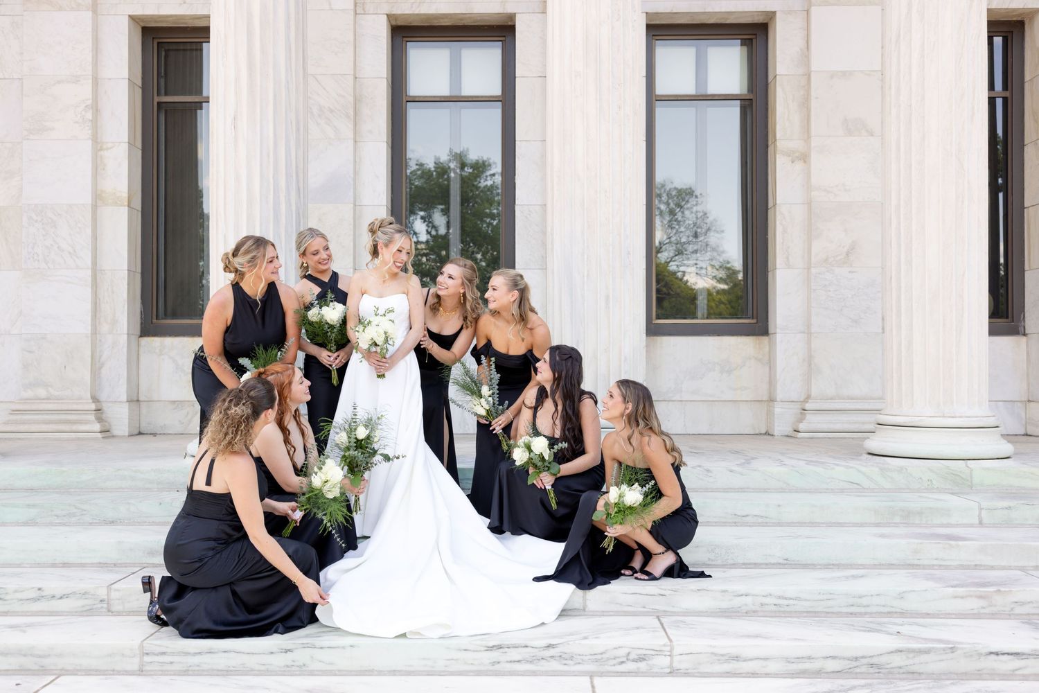 Bride and groom portraits at the Toledo Museum of Art before a Toledo Zoo wedding in Toledo, Ohio photographed by Julia & Sean Photography
