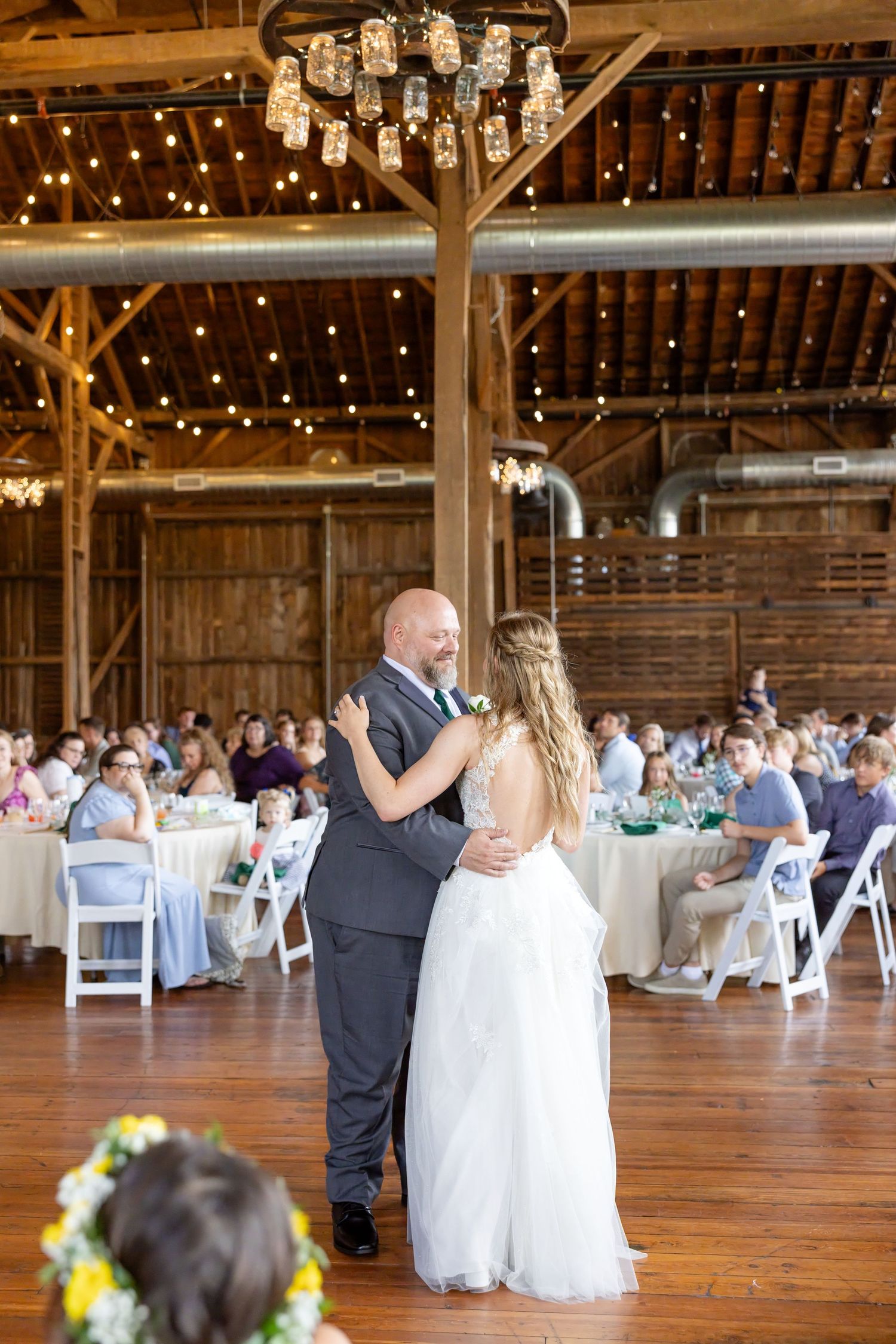 Joyful summer wedding at The Bicentennial Barn in Dayton, Ohio, photographed by Dayton wedding photographers Julia and Sean Photography.