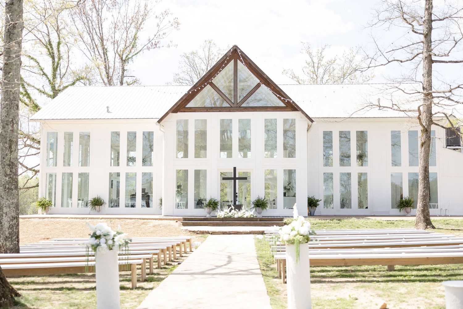 Elegant Glass House wedding near Huntsville, Alabama with natural light, romantic portraits, and faith-filled ceremony moments