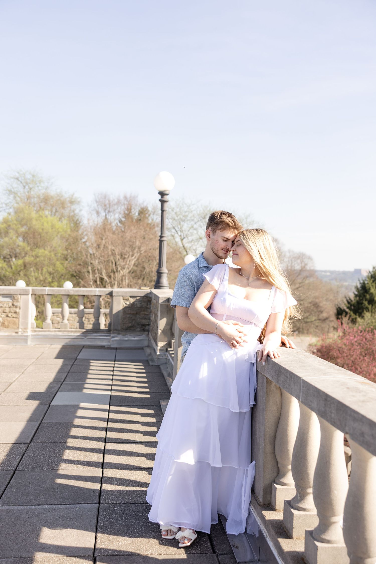 Cincinnati engagement session at Ault Park with light and airy style, capturing joyful, natural moments in a spring park setting