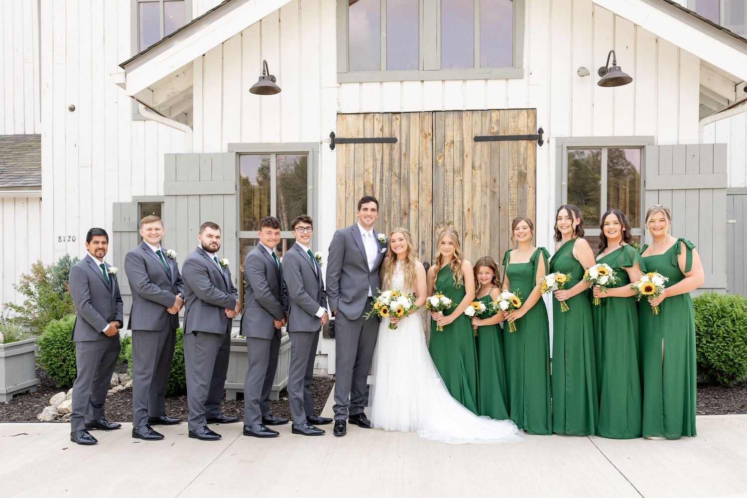 Joyful summer wedding at The Bicentennial Barn in Dayton, Ohio, photographed by Dayton wedding photographers Julia and Sean Photography.