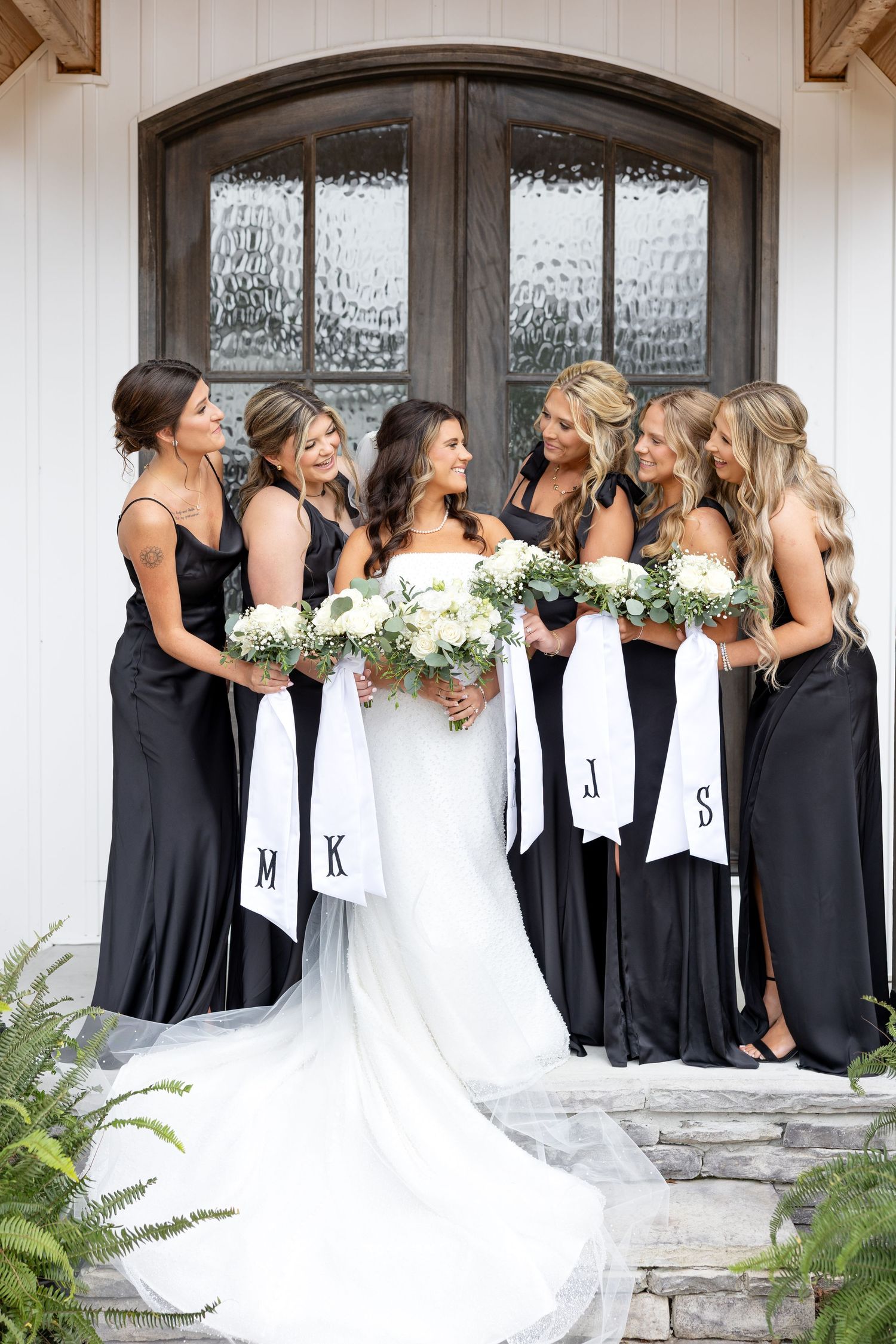 Elegant wedding at The Upton House in Guntersville, Alabama featuring a joyful bride and groom and timeless southern elegance.