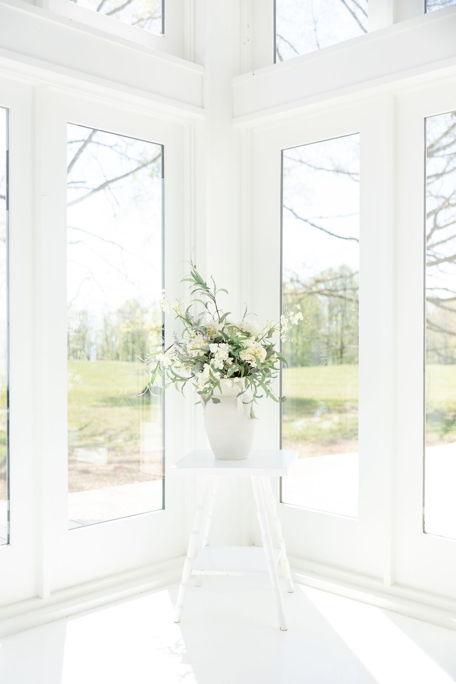 Light and airy wedding photos at The Glass House near Huntsville, Alabama capturing joyful, timeless moments of a bride and groom