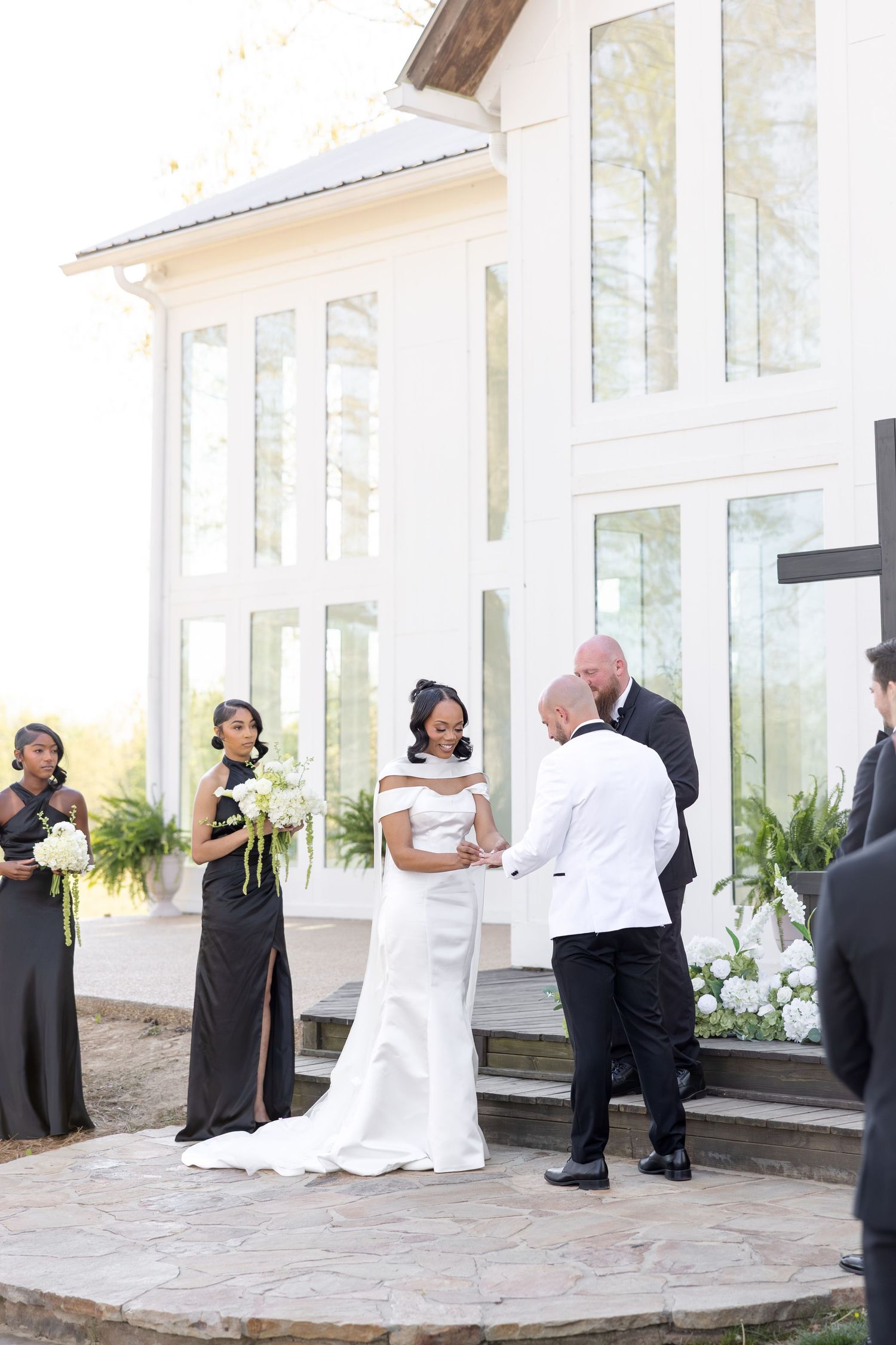 Elegant Glass House wedding near Huntsville, Alabama with natural light, romantic portraits, and faith-filled ceremony moments