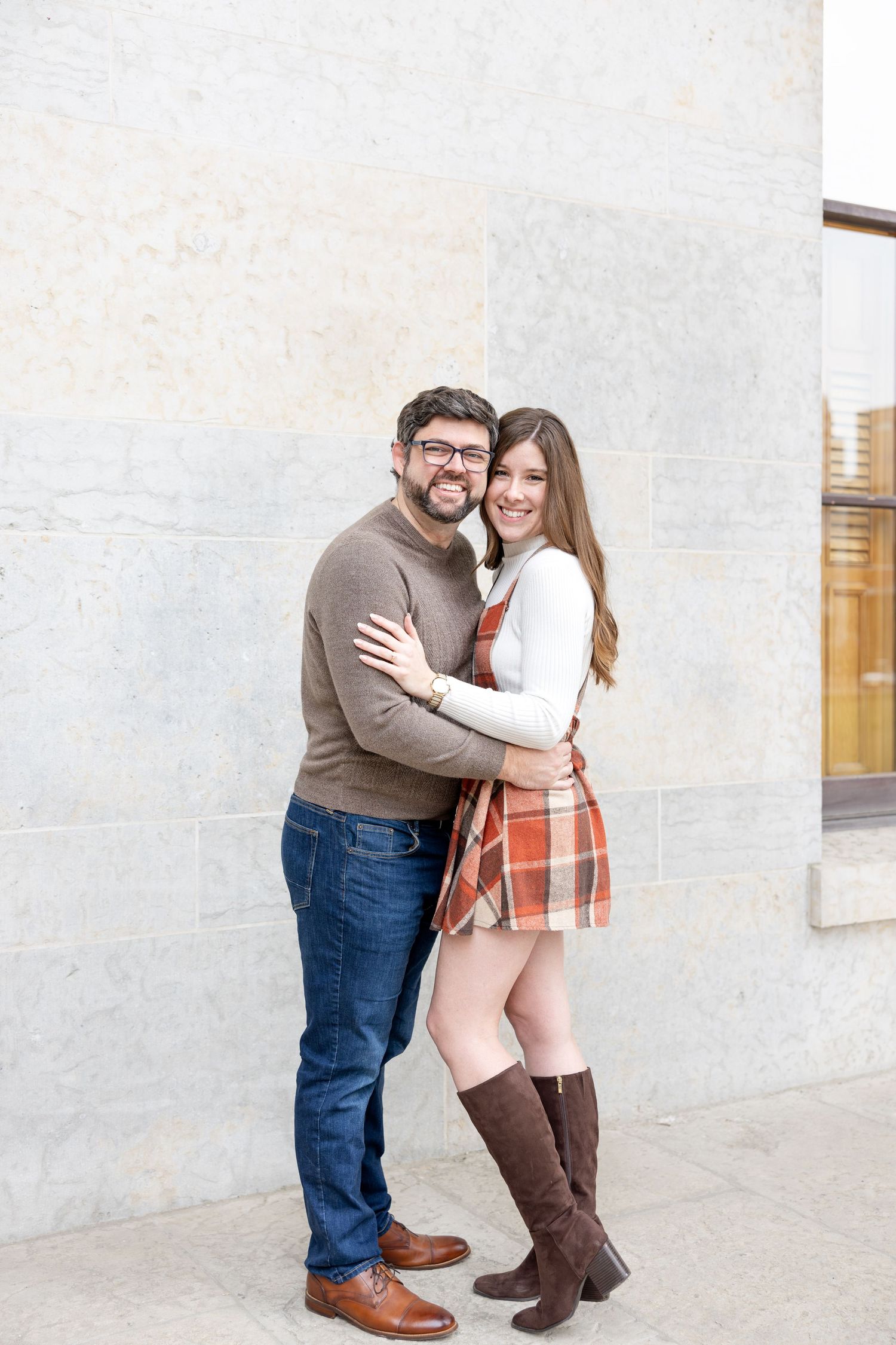 Ohio Statehouse engagement photos in downtown Columbus Ohio with a joyful couple in a light and airy style