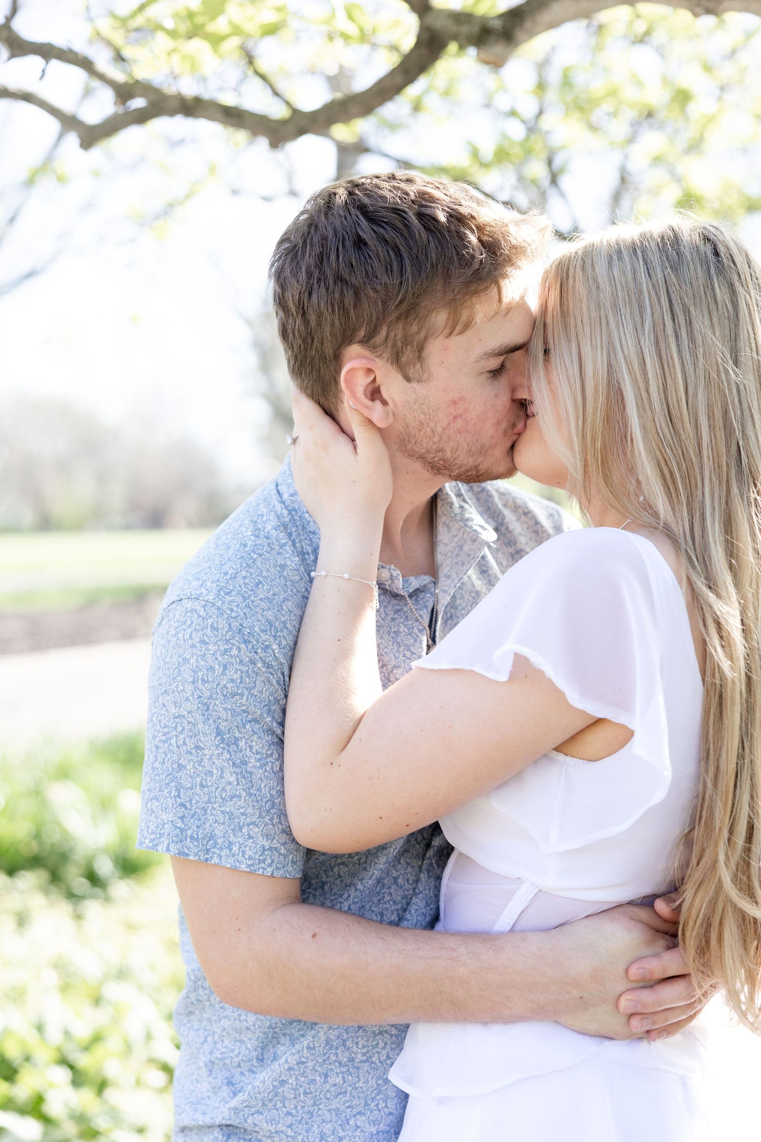Cincinnati engagement session at Ault Park with light and airy style, capturing joyful, natural moments in a spring park setting