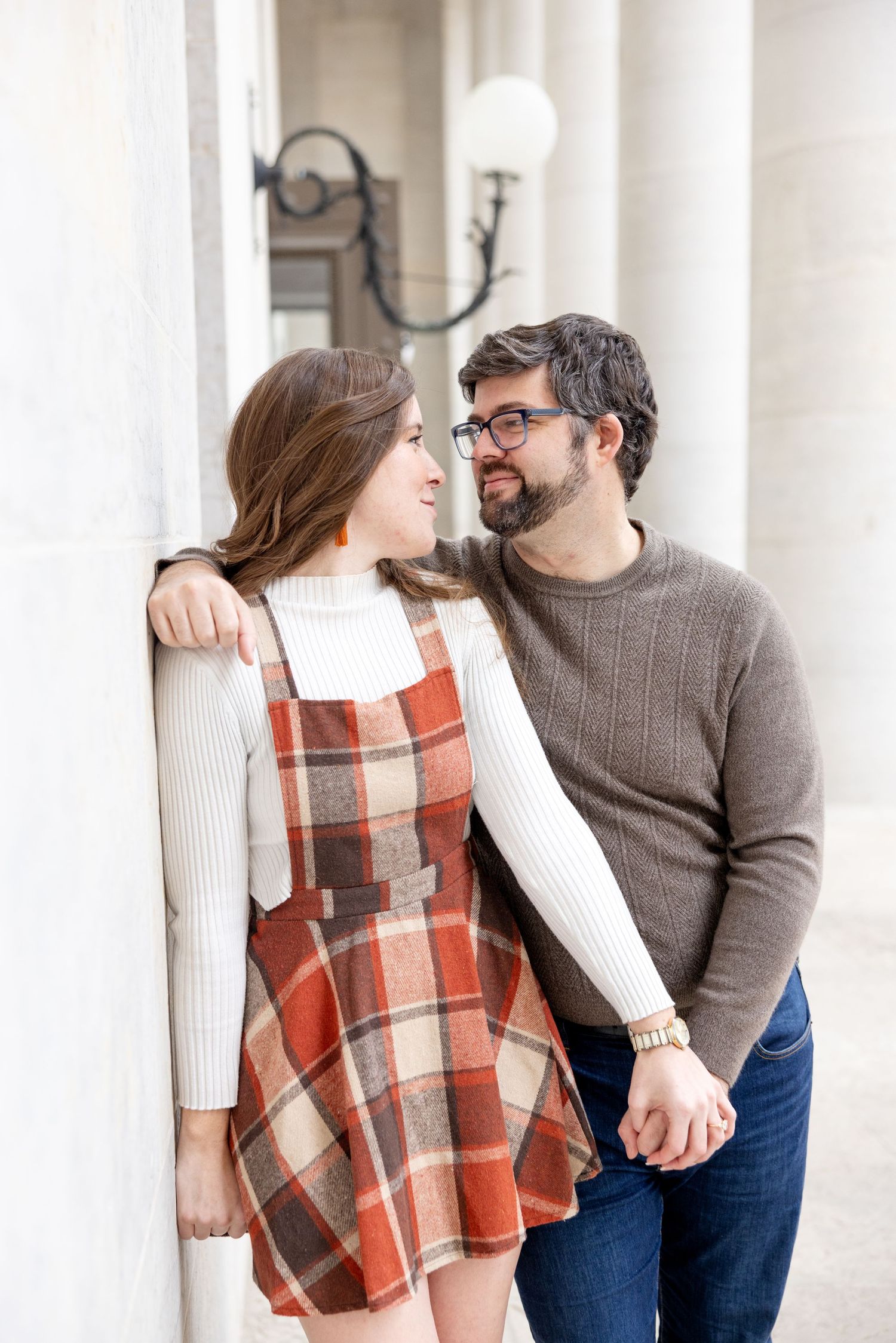 Ohio Statehouse engagement photos in downtown Columbus Ohio with a joyful couple in a light and airy style