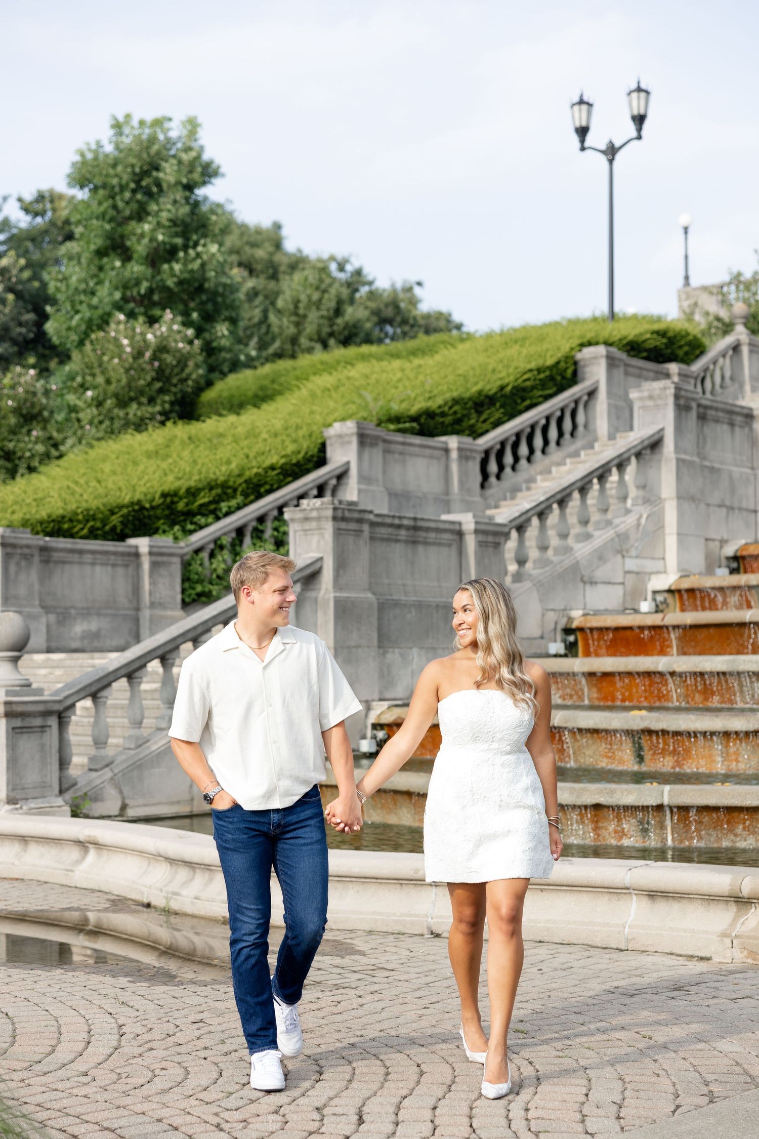 Romantic Ault Park engagement photos in Cincinnati, Ohio by Julia & Sean Photography, capturing a joyful couple during a golden hour engagem