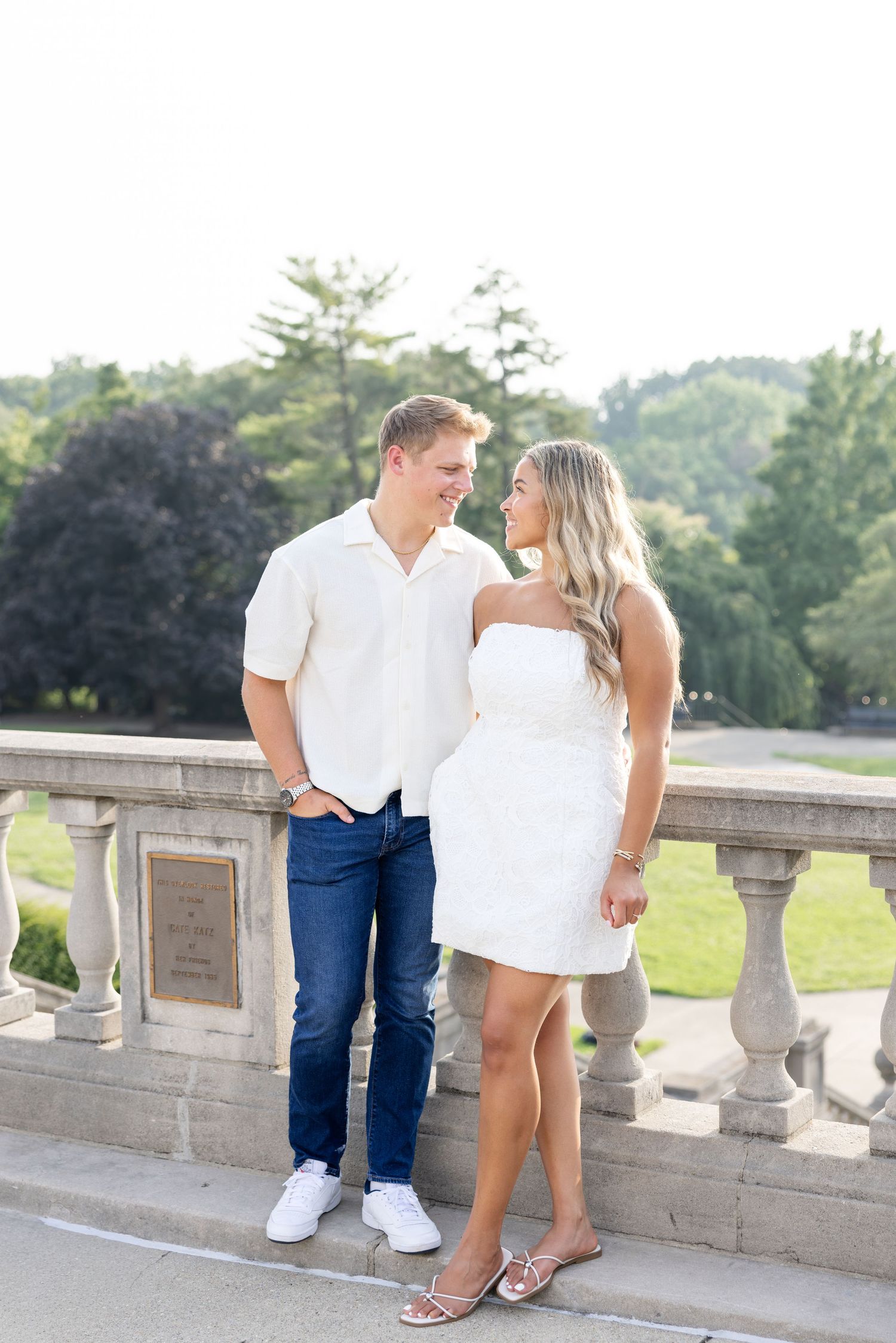 Romantic Ault Park engagement photos in Cincinnati, Ohio by Julia & Sean Photography, capturing a joyful couple during a golden hour engagem