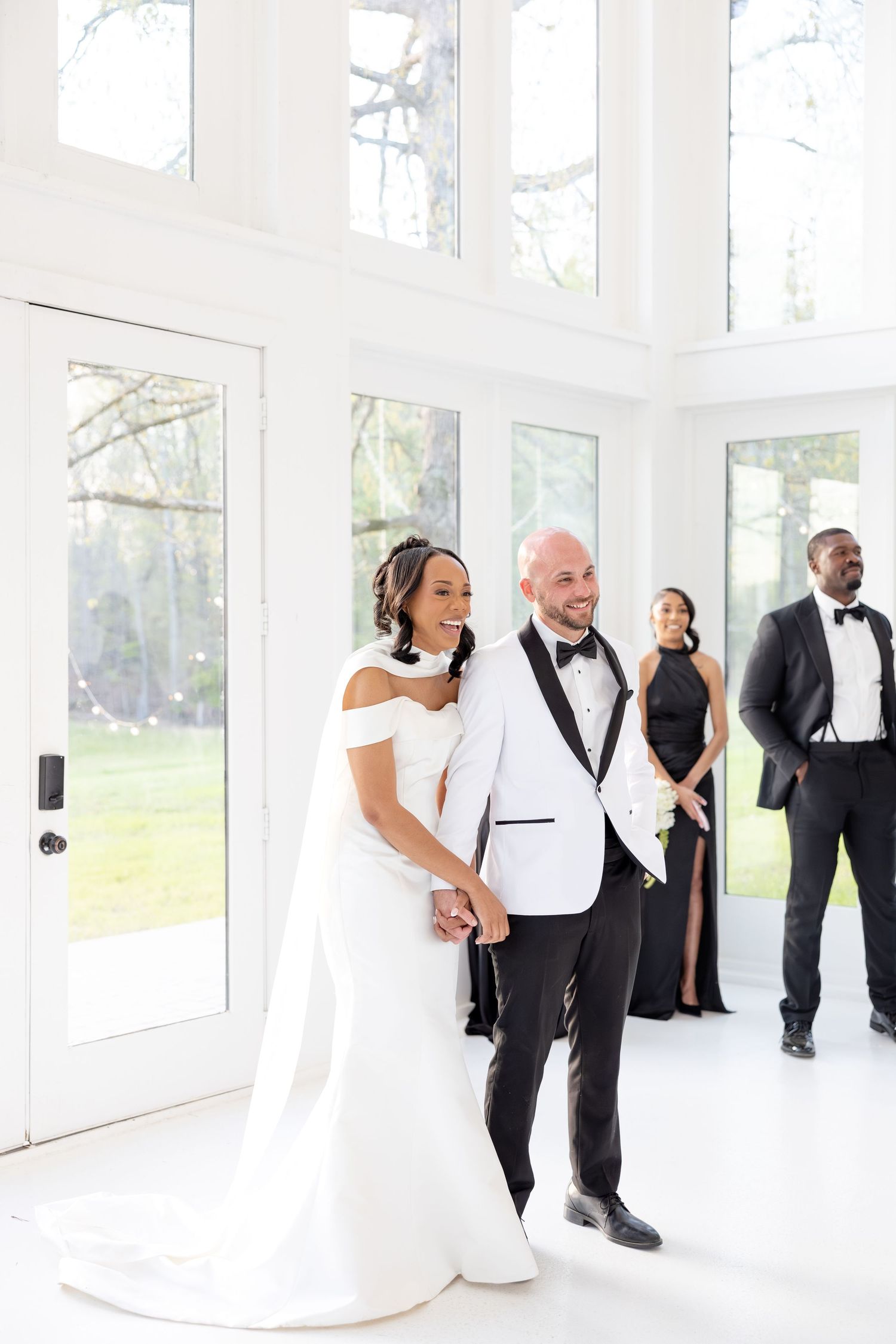 Light and airy wedding photos at The Glass House near Huntsville, Alabama capturing joyful, timeless moments of a bride and groom