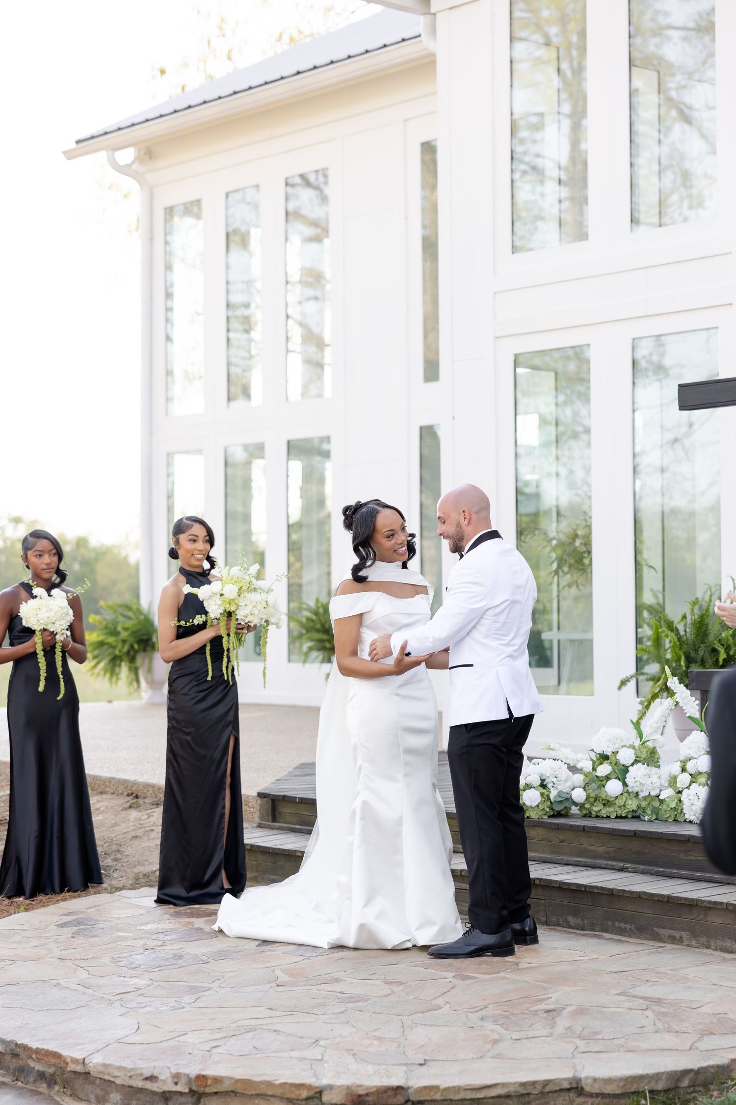 Elegant Glass House wedding near Huntsville, Alabama with natural light, romantic portraits, and faith-filled ceremony moments