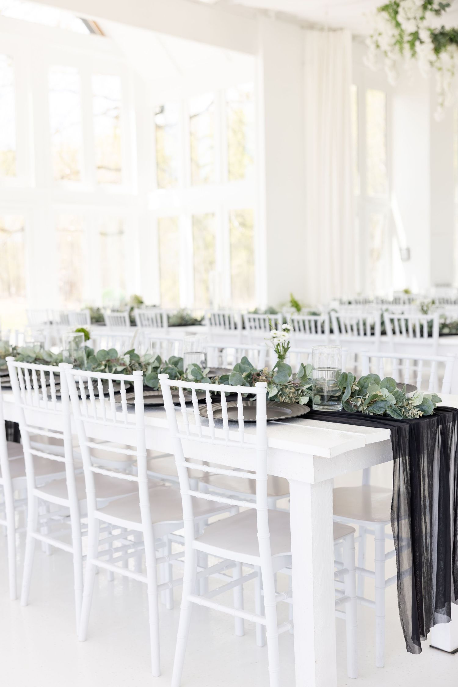 Light and airy wedding photos at The Glass House near Huntsville, Alabama capturing joyful, timeless moments of a bride and groom