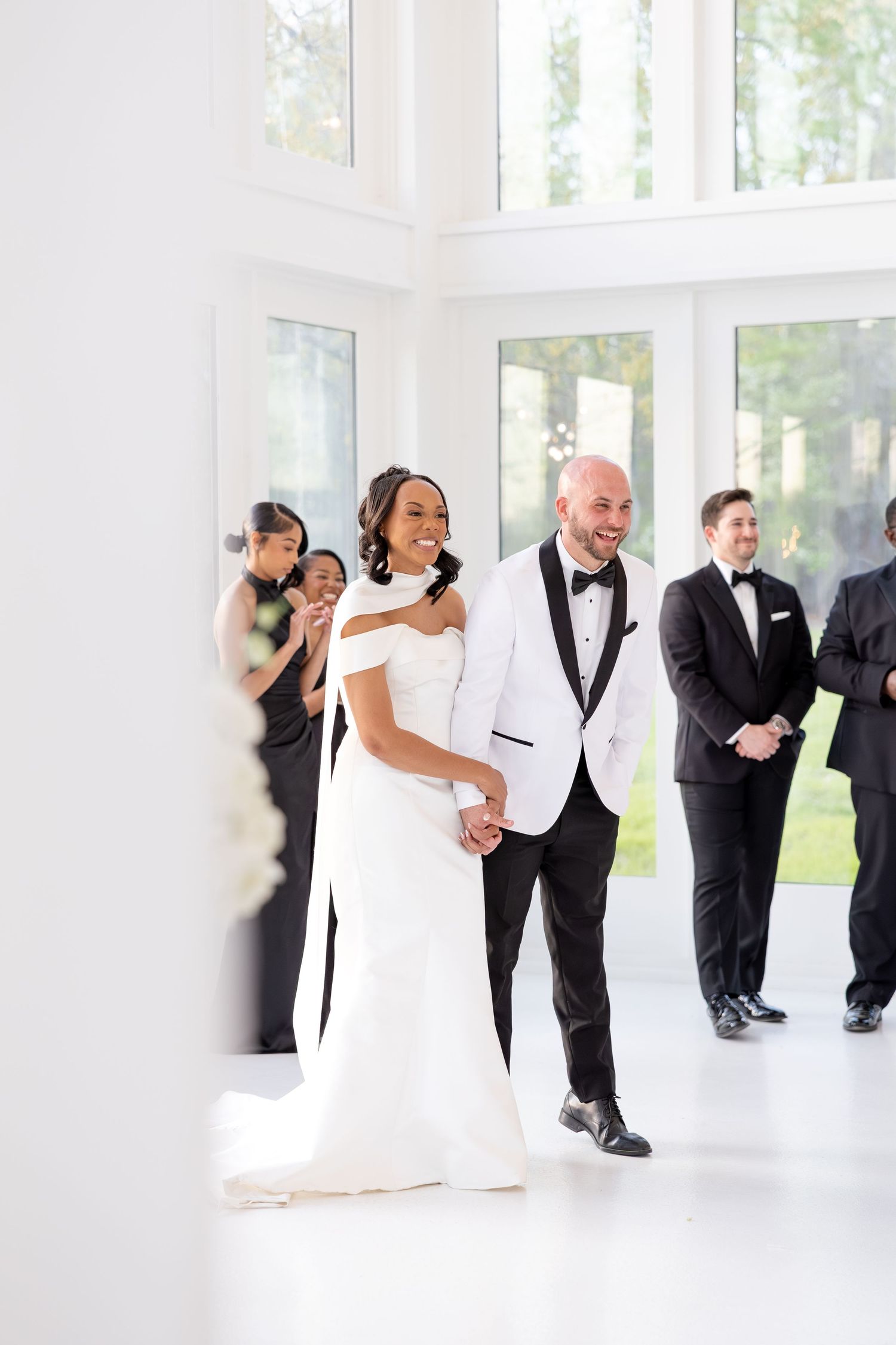 Light and airy wedding photos at The Glass House near Huntsville, Alabama capturing joyful, timeless moments of a bride and groom