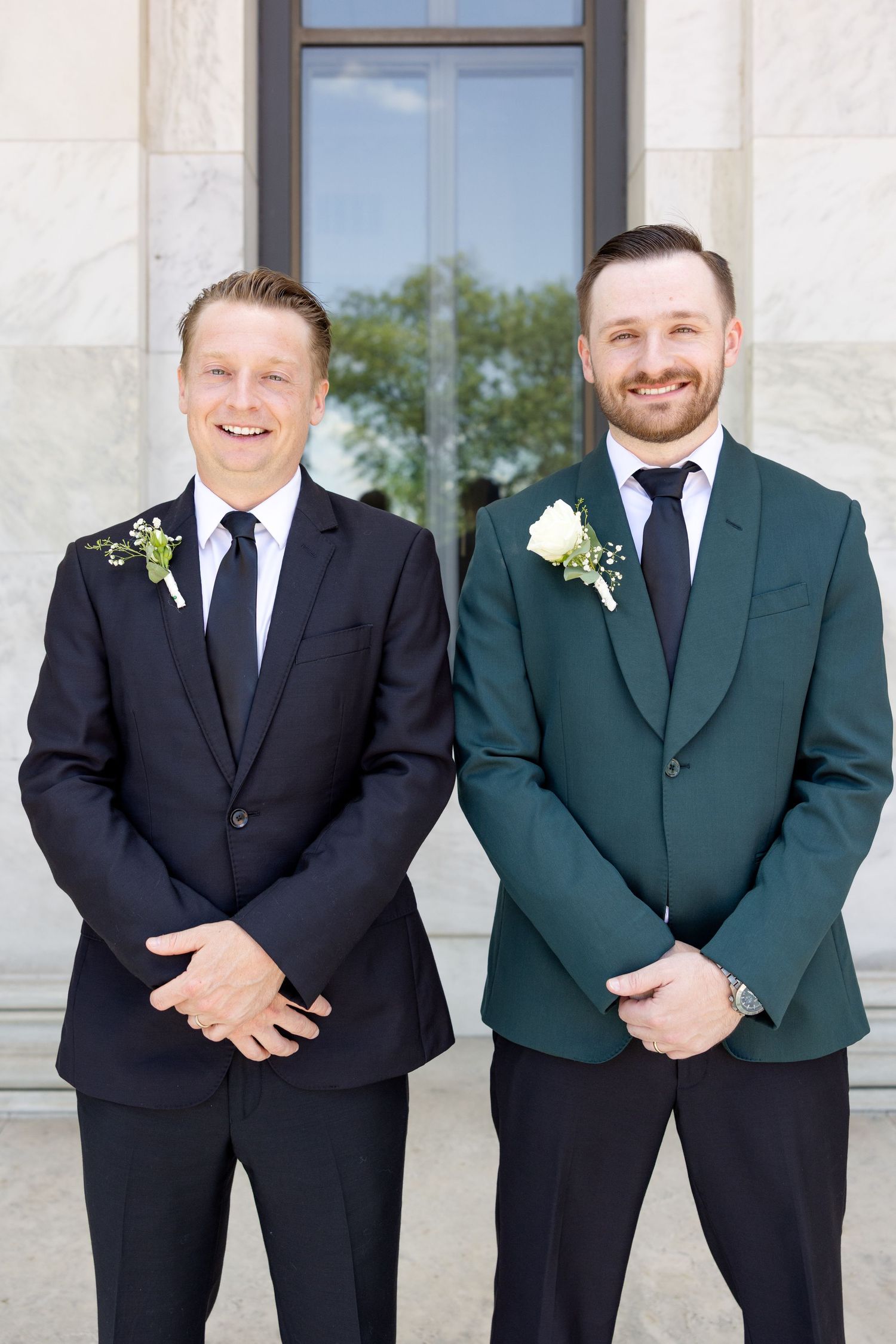 Bride and groom portraits at the Toledo Museum of Art before a Toledo Zoo wedding in Toledo, Ohio photographed by Julia & Sean Photography