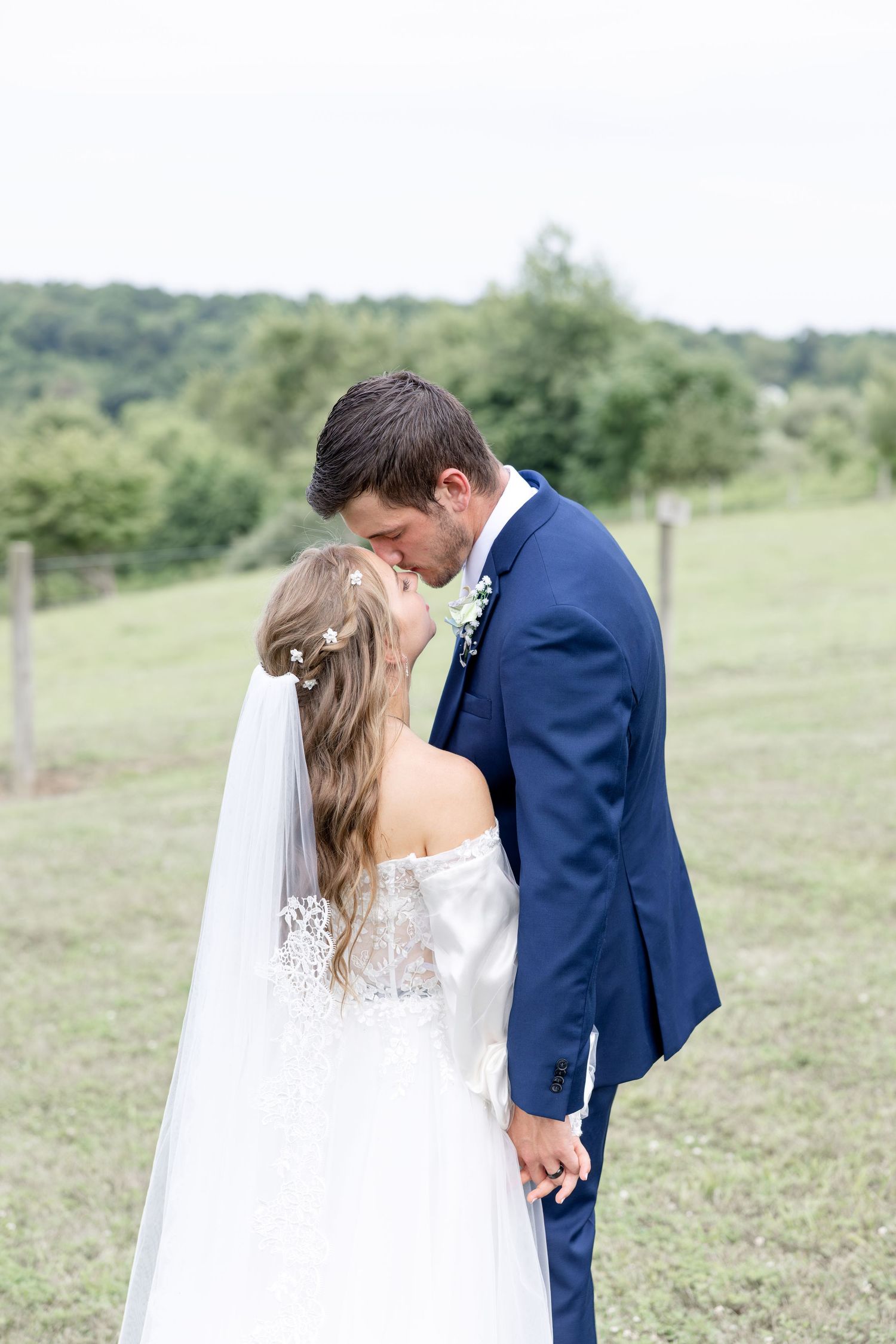 Romantic summer wedding in Northeast Ohio at Heartland on Heritage by Julia and Sean Photography, husband-and-wife wedding photographers.