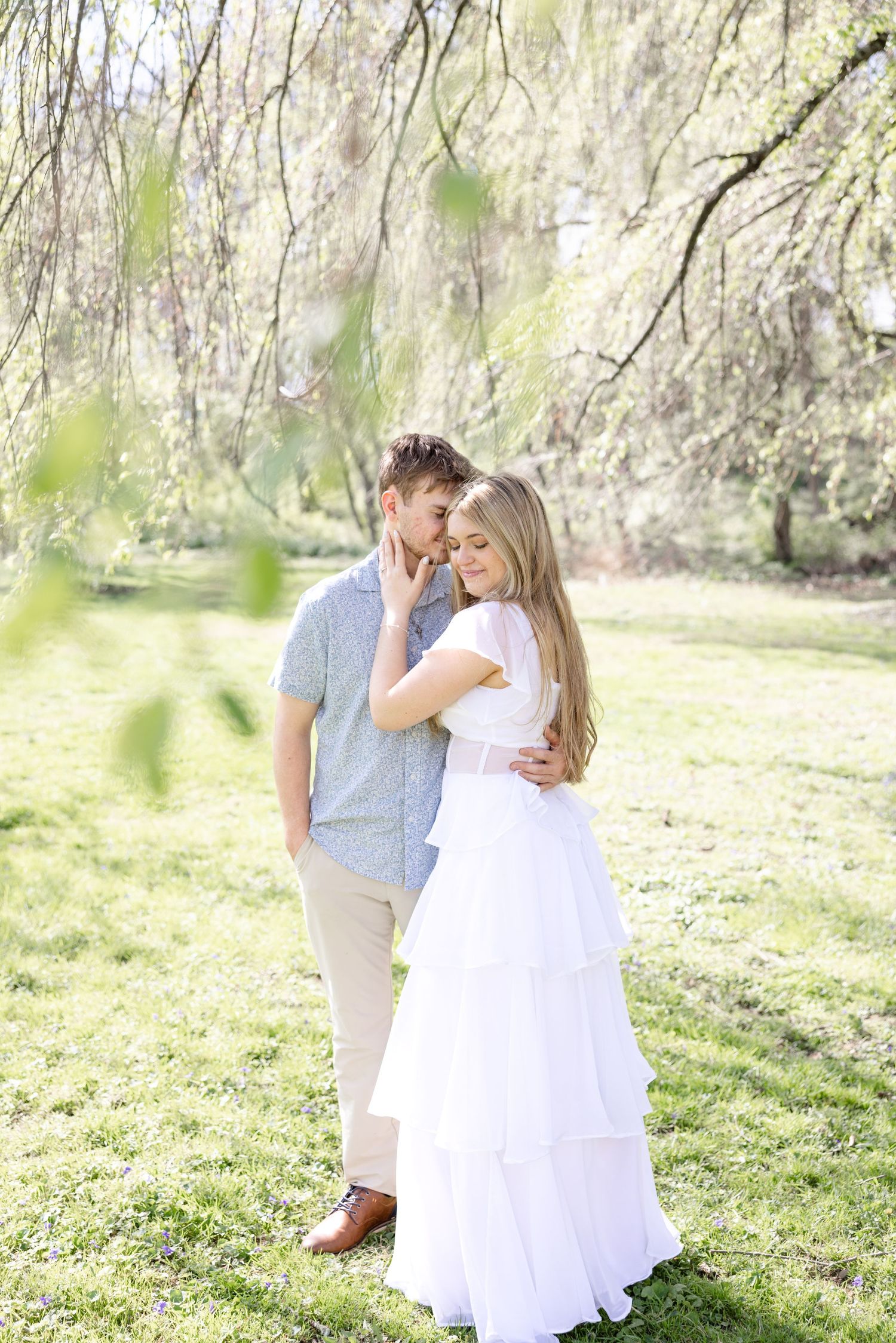Cincinnati engagement session at Ault Park with light and airy style, capturing joyful, natural moments in a spring park setting