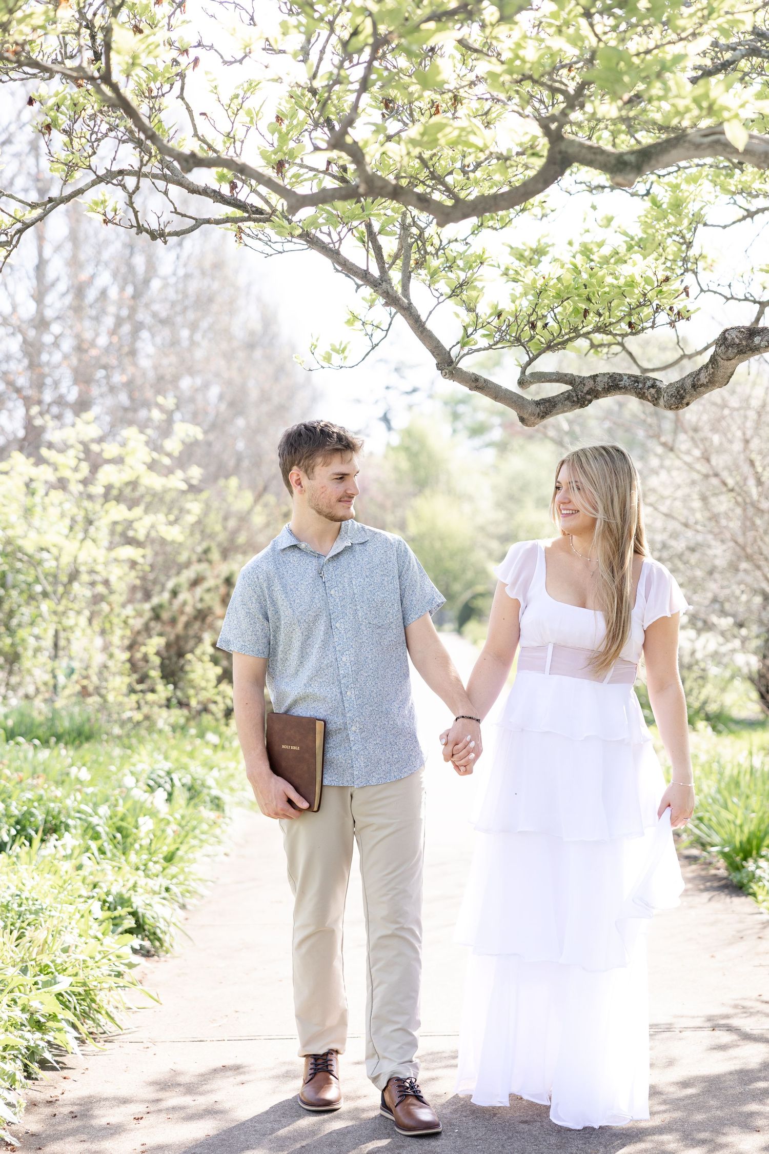 Cincinnati engagement session at Ault Park with light and airy style, capturing joyful, natural moments in a spring park setting