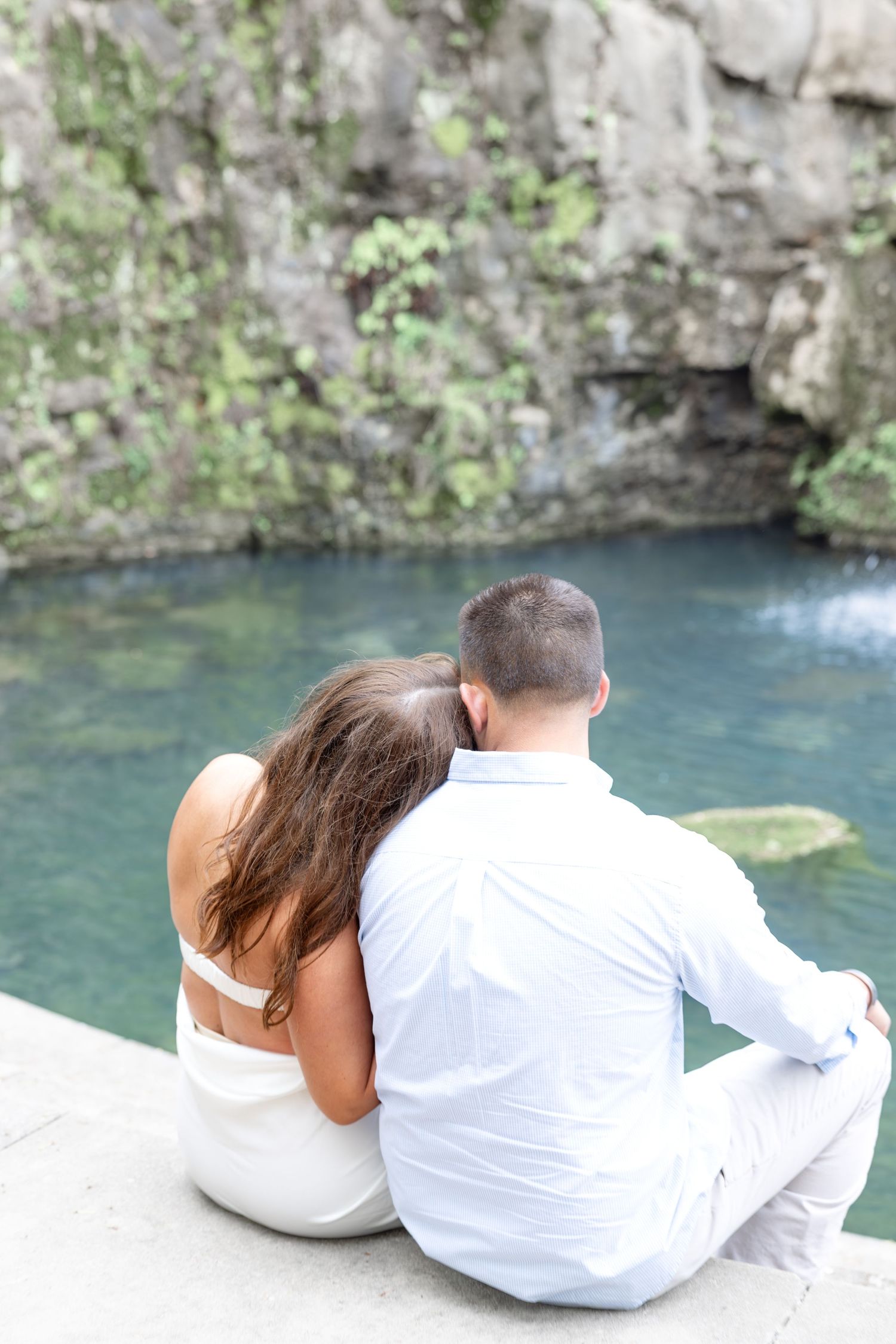 Downtown Huntsville engagement session at First National Bank and Big Spring Park by Julia and Sean Photography, capturing joyful moments.