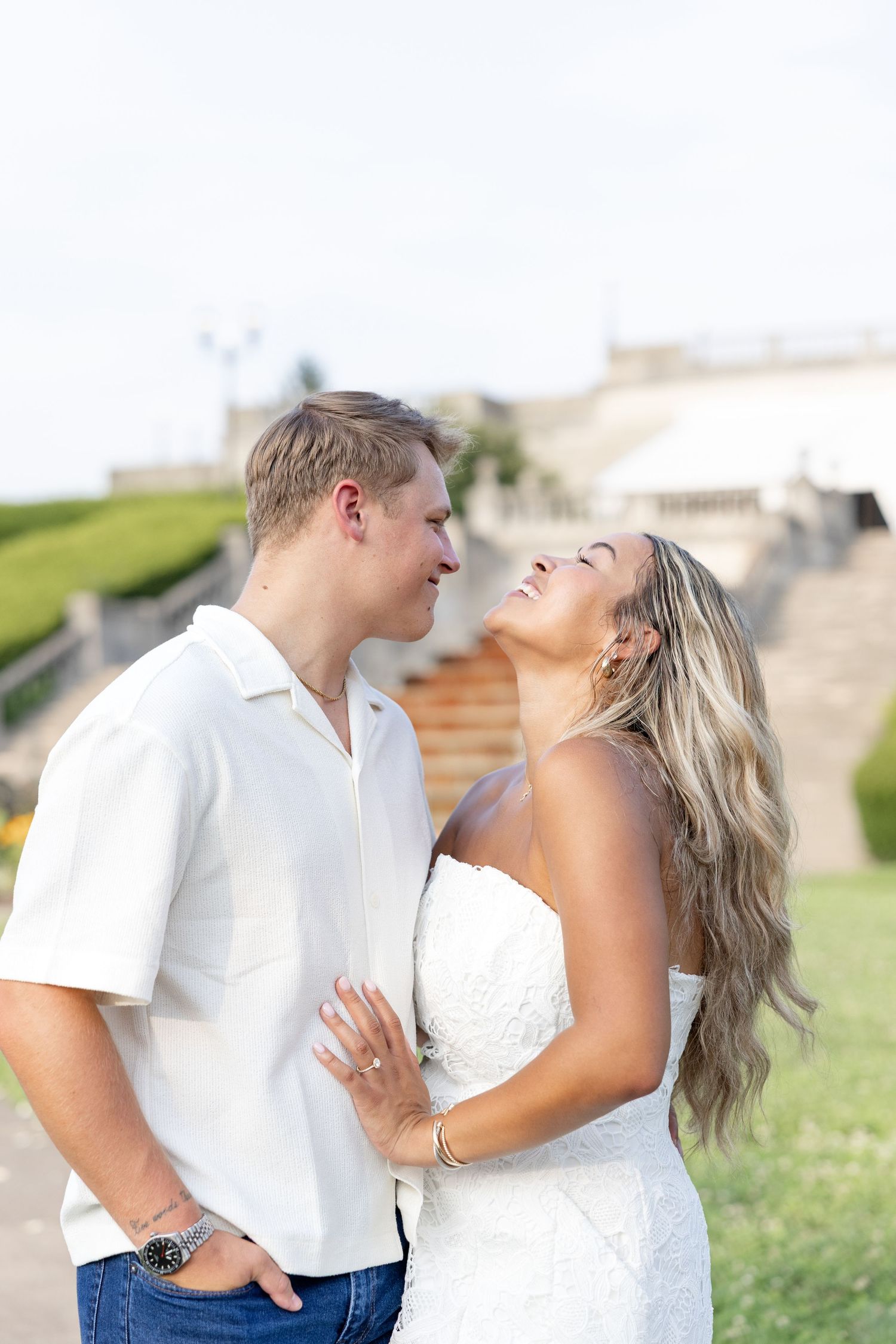 Romantic Ault Park engagement photos in Cincinnati, Ohio by Julia & Sean Photography, capturing a joyful couple during a golden hour engagem