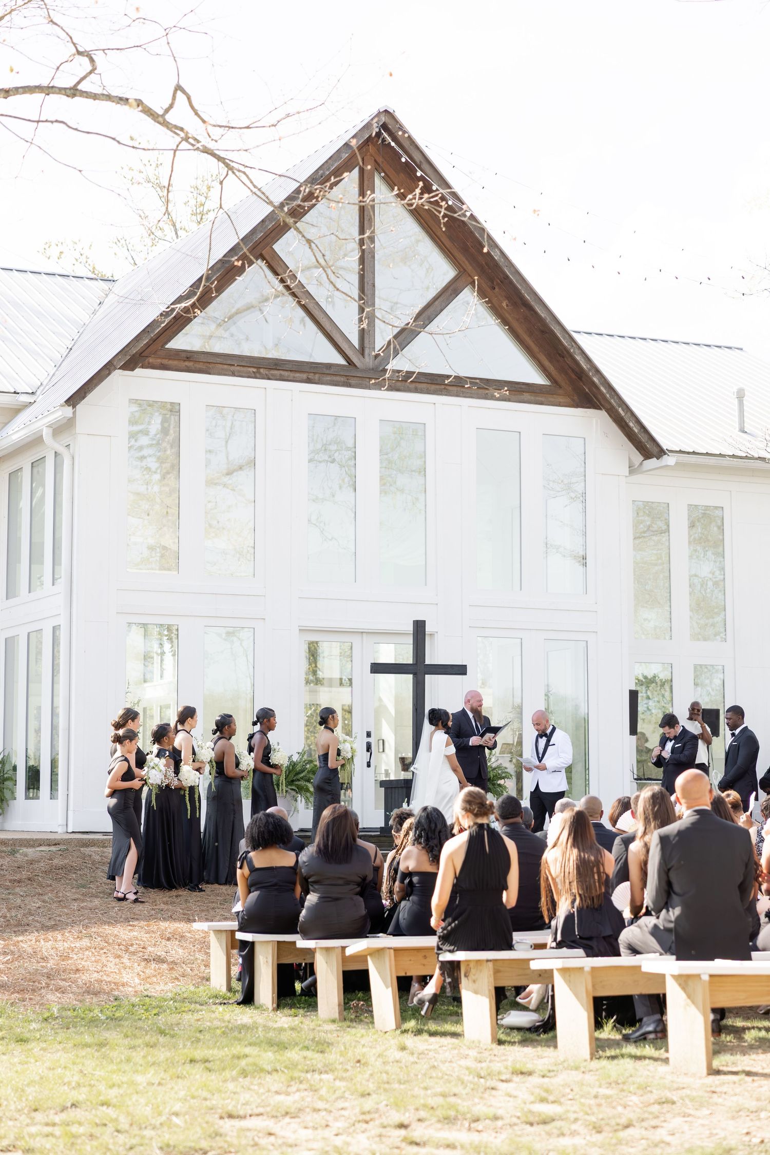 Elegant Glass House wedding near Huntsville, Alabama with natural light, romantic portraits, and faith-filled ceremony moments