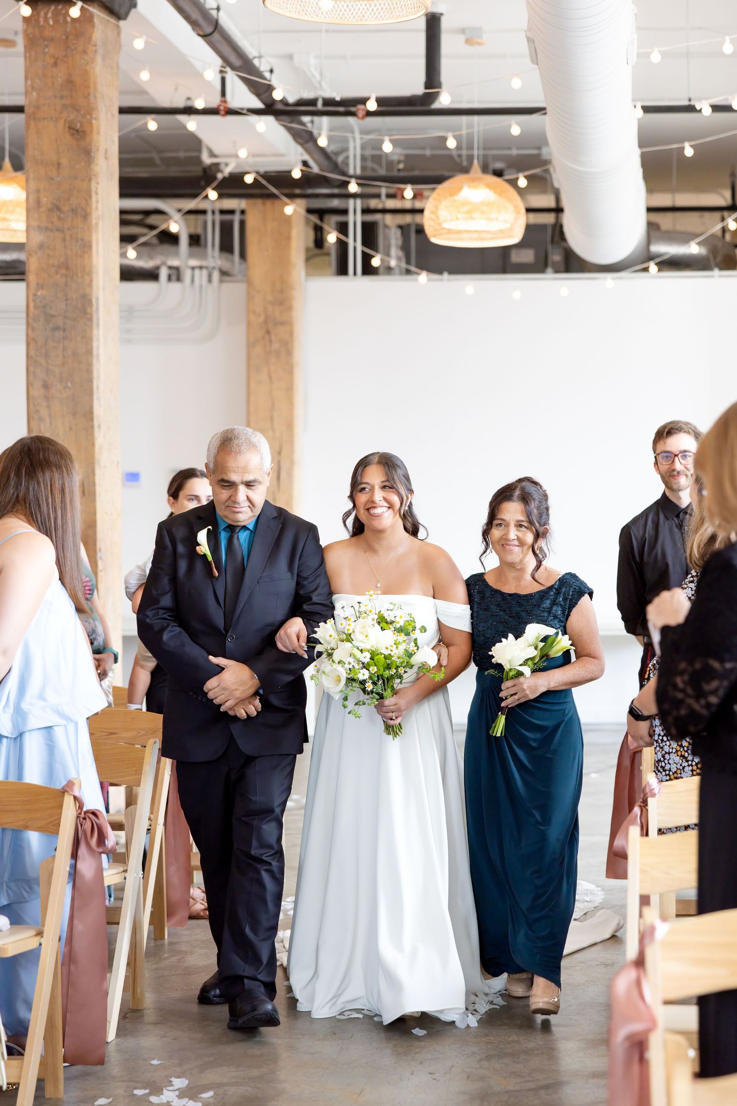 Bride and groom celebrating their Flat 51 wedding in downtown Columbus, Ohio, captured with timeless, light and airy wedding photography.
