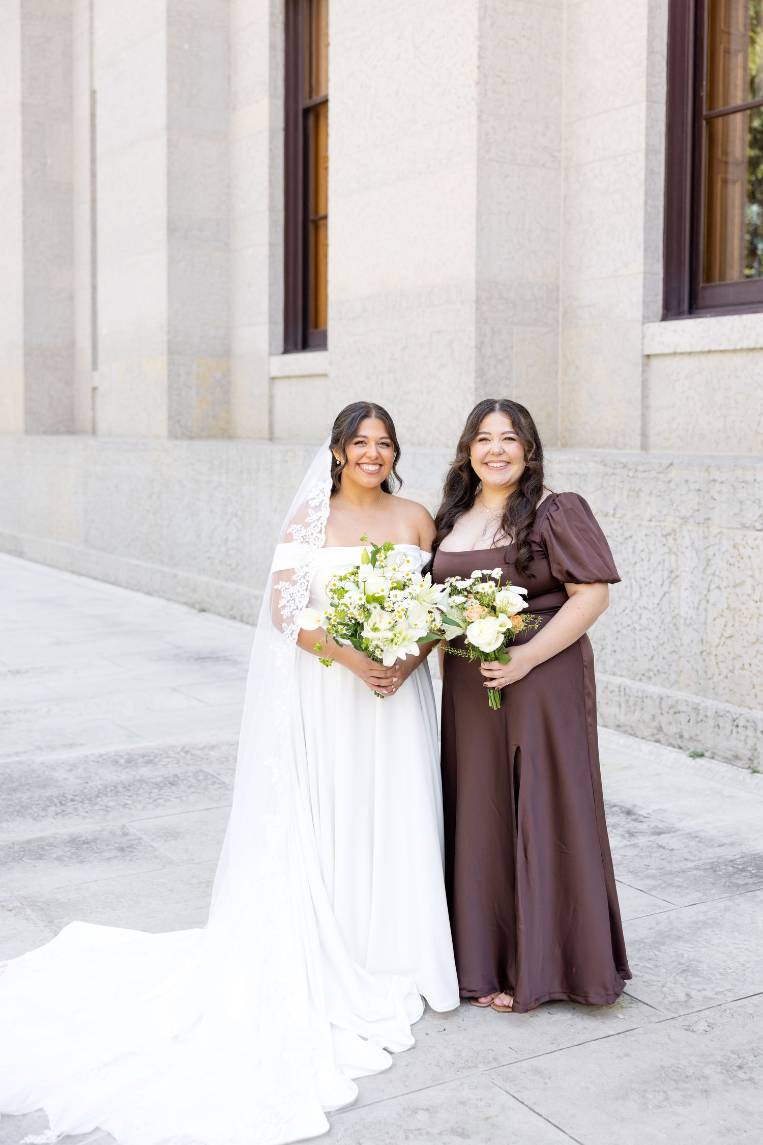 Bride and groom celebrating their Flat 51 wedding in downtown Columbus, Ohio, captured with timeless, light and airy wedding photography.