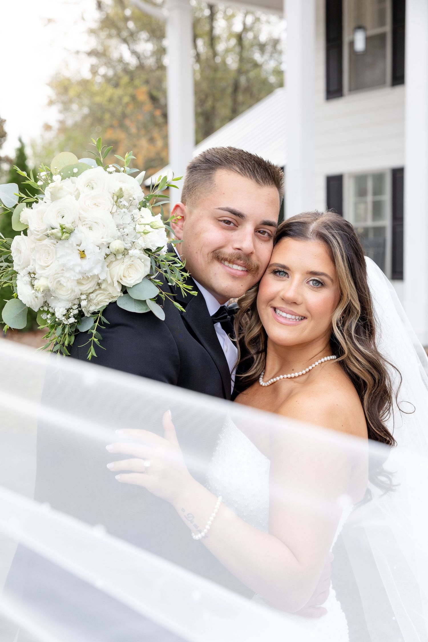 Elegant wedding at The Upton House in Guntersville, Alabama featuring a joyful bride and groom and timeless southern elegance.