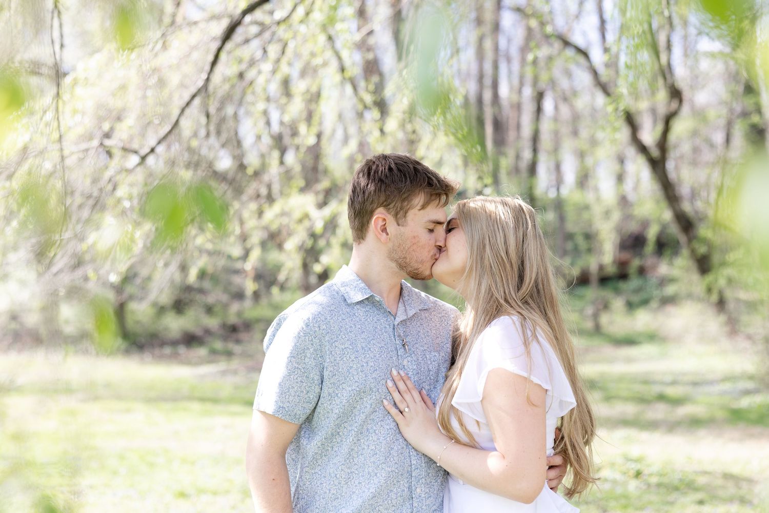 Cincinnati engagement session at Ault Park with light and airy style, capturing joyful, natural moments in a spring park setting