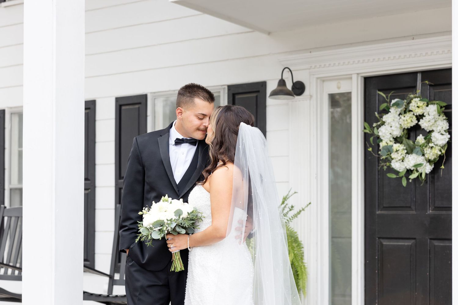 Elegant wedding at The Upton House in Guntersville, Alabama featuring a joyful bride and groom and timeless southern elegance.