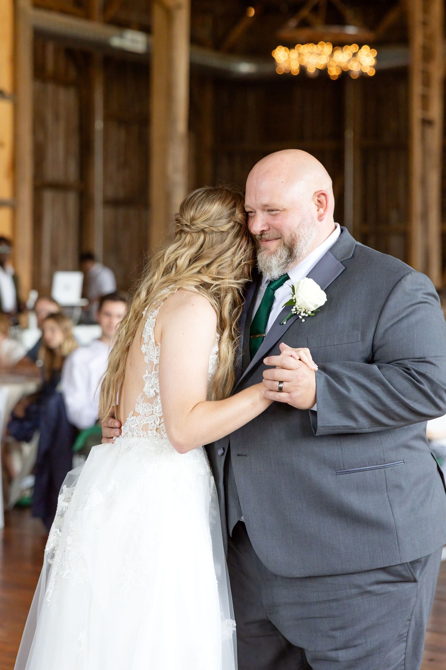 Joyful summer wedding at The Bicentennial Barn in Dayton, Ohio, photographed by Dayton wedding photographers Julia and Sean Photography.
