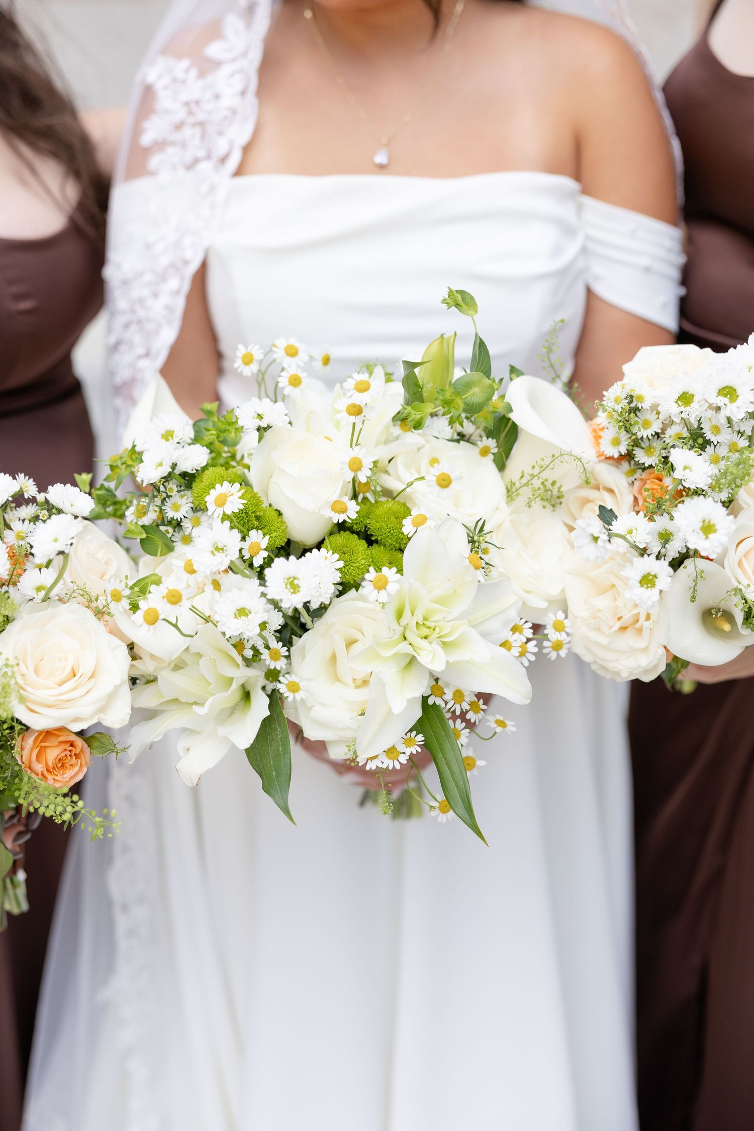 Bride and groom celebrating their Flat 51 wedding in downtown Columbus, Ohio, captured with timeless, light and airy wedding photography.