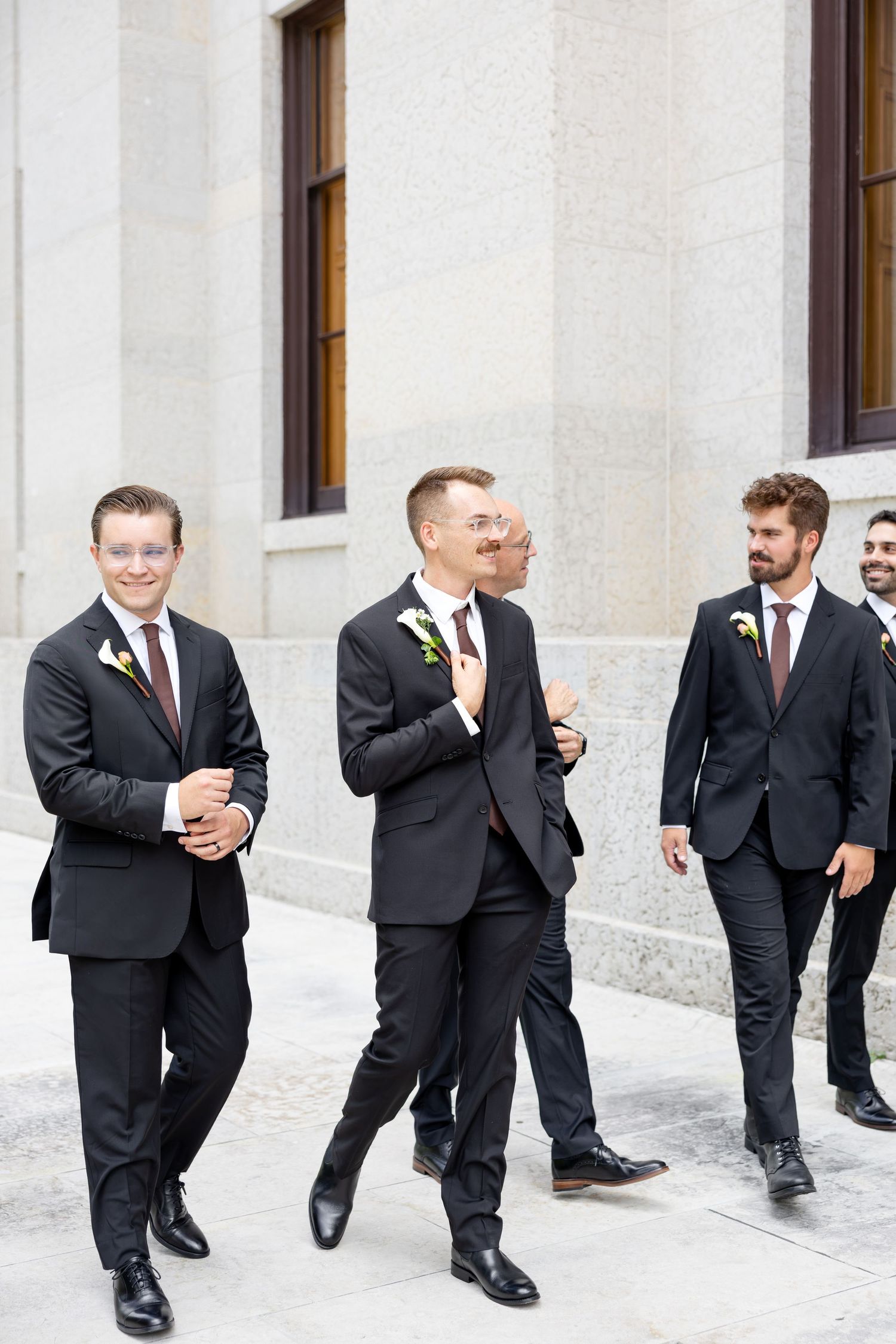 Bride and groom celebrating their Flat 51 wedding in downtown Columbus, Ohio, captured with timeless, light and airy wedding photography.