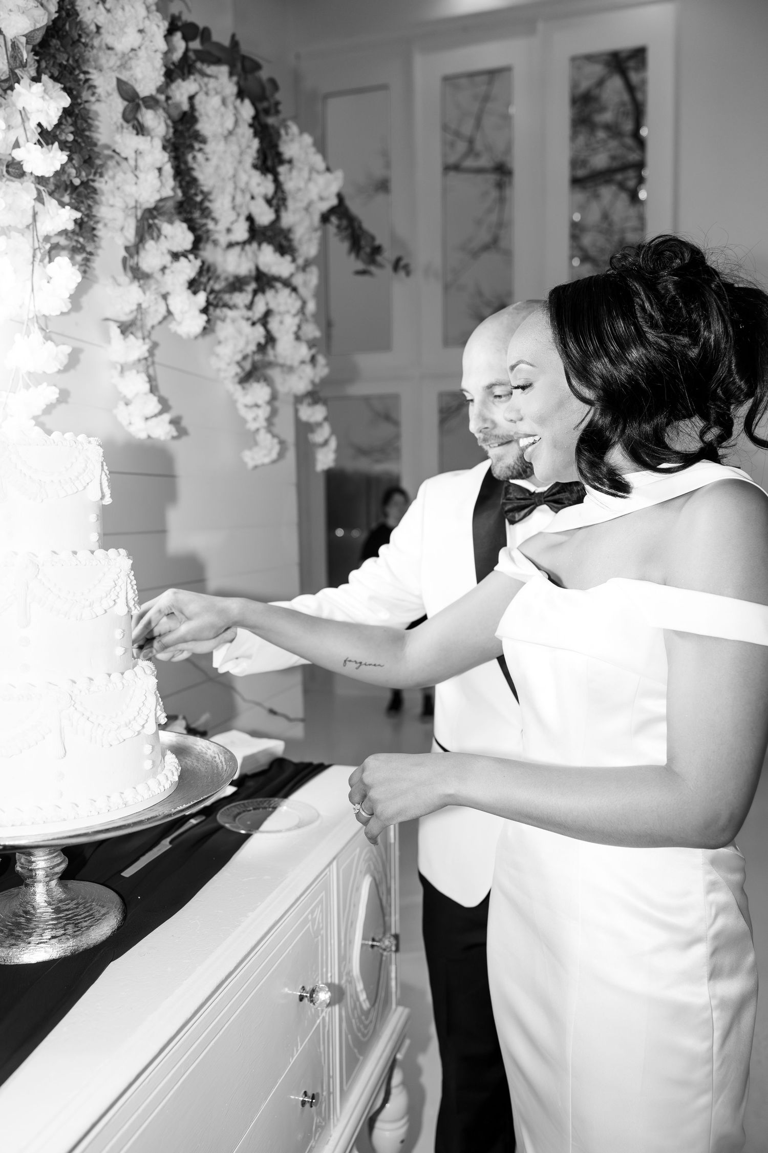 Light and airy wedding photos at The Glass House near Huntsville, Alabama capturing joyful, timeless moments of a bride and groom