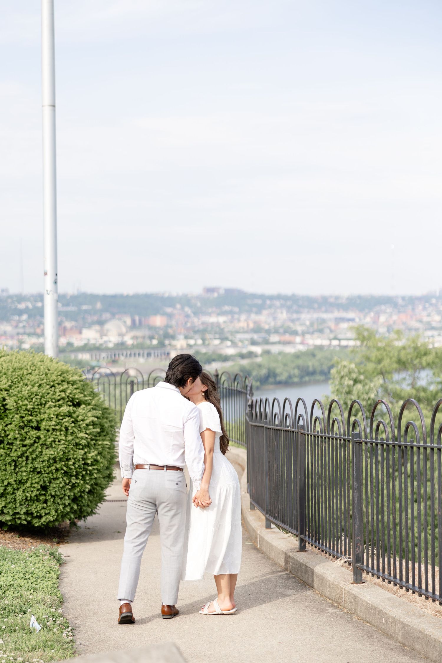 Romantic engagement photos at Mt. Echo Park overlooking the Cincinnati skyline in Cincinnati, Ohio by Julia and Sean Photography
