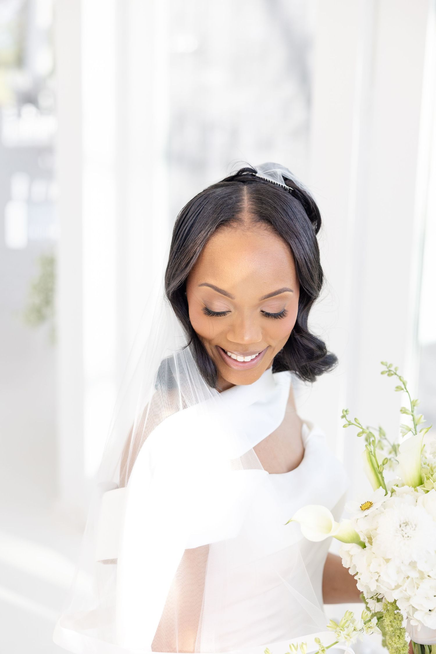 Light and airy wedding photos at The Glass House near Huntsville, Alabama capturing joyful, timeless moments of a bride and groom