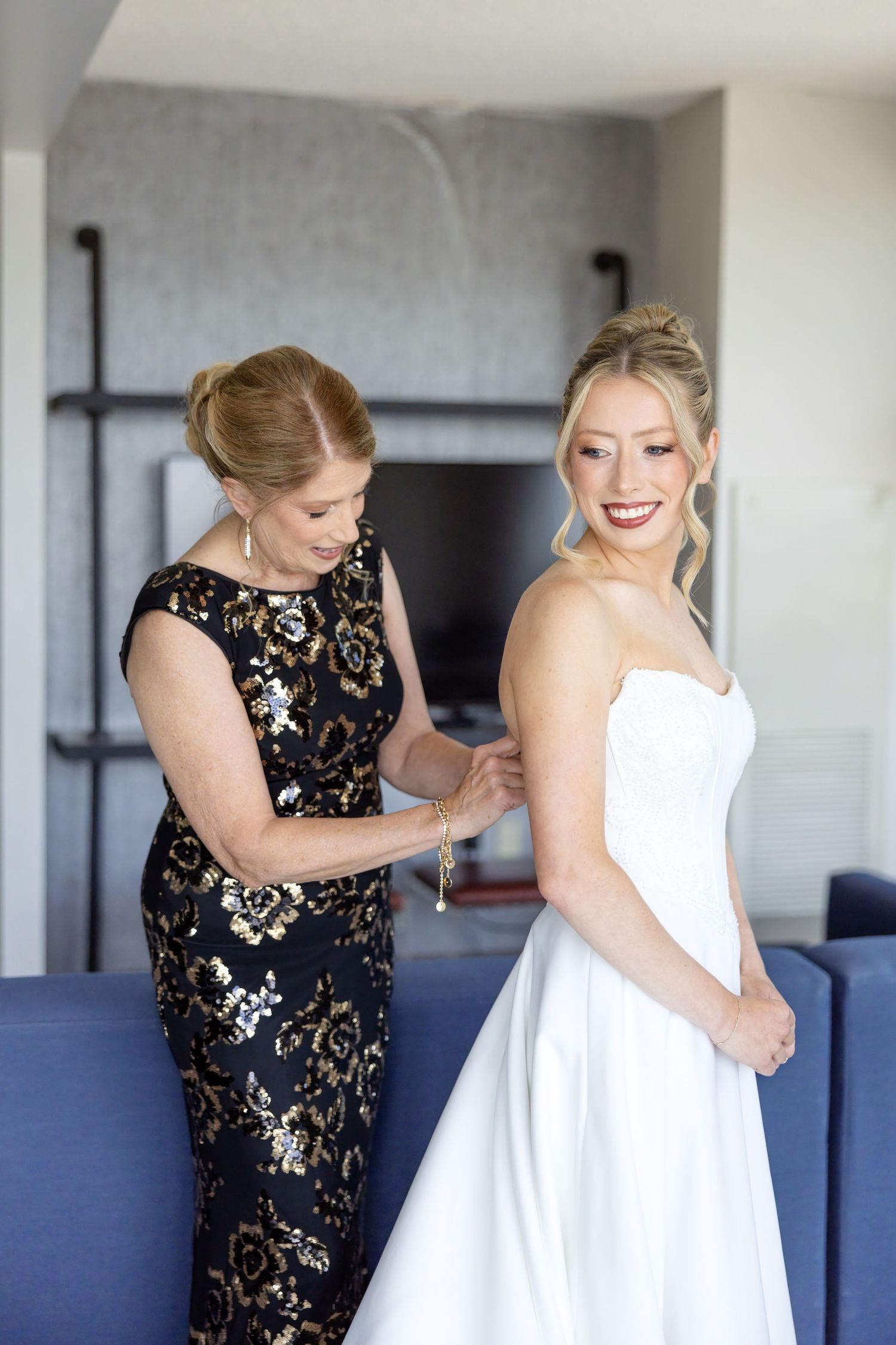 Getting ready photos at The Renaissance Hotel in downtown Toledo before a joyful Toledo Zoo wedding photographed by Julia & Sean Photography