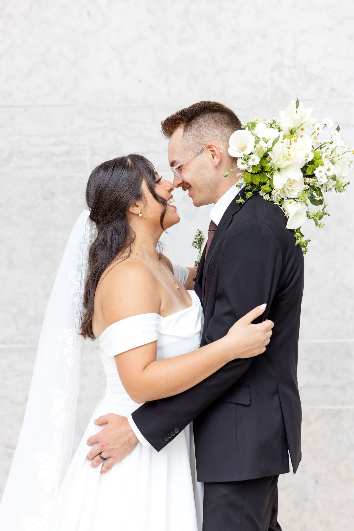 Bride and groom portraits at the Ohio Statehouse in downtown Columbus, Ohio, captured with timeless, light and airy wedding photography.